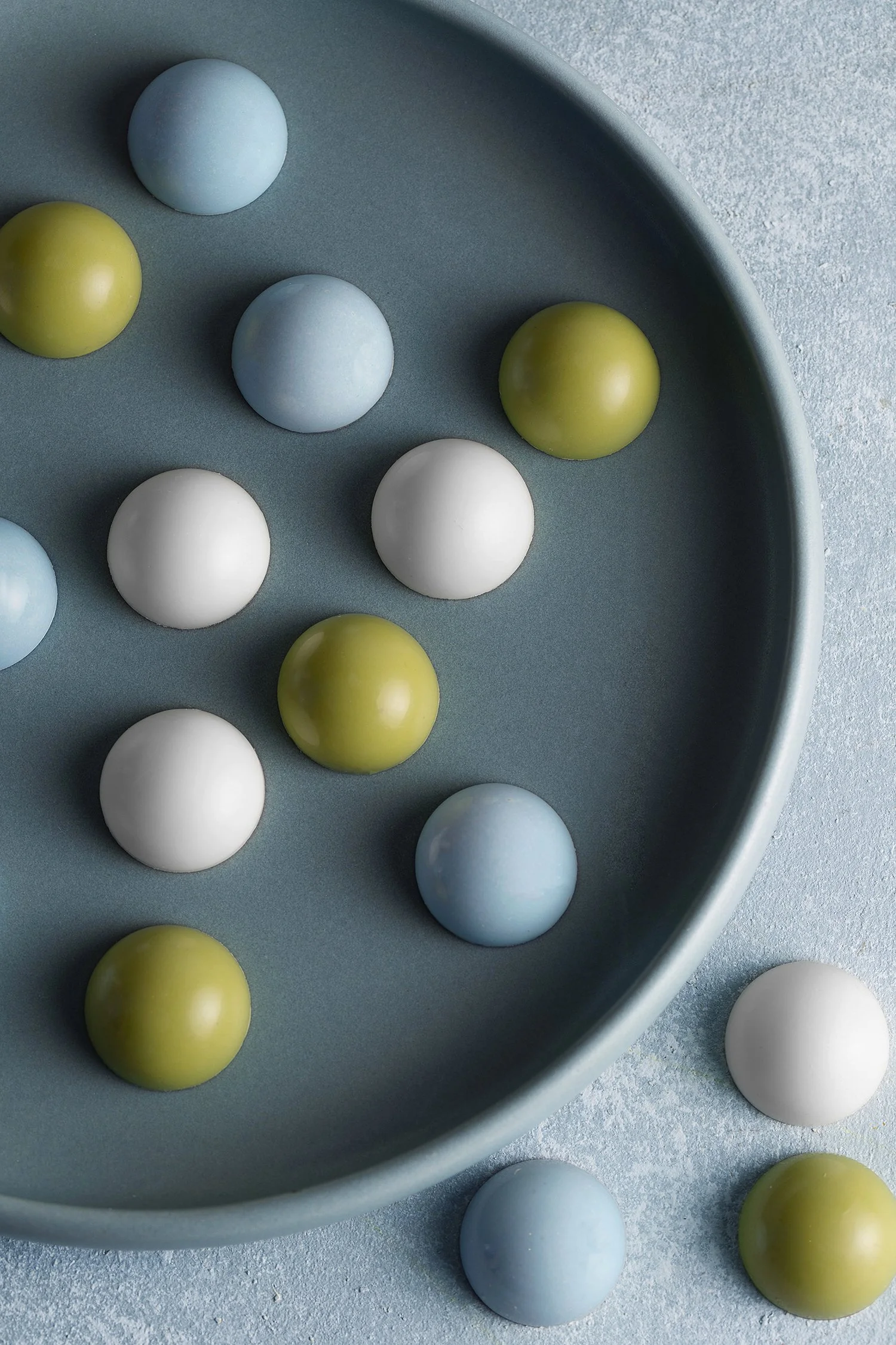 Colorful round candies in pastel colors