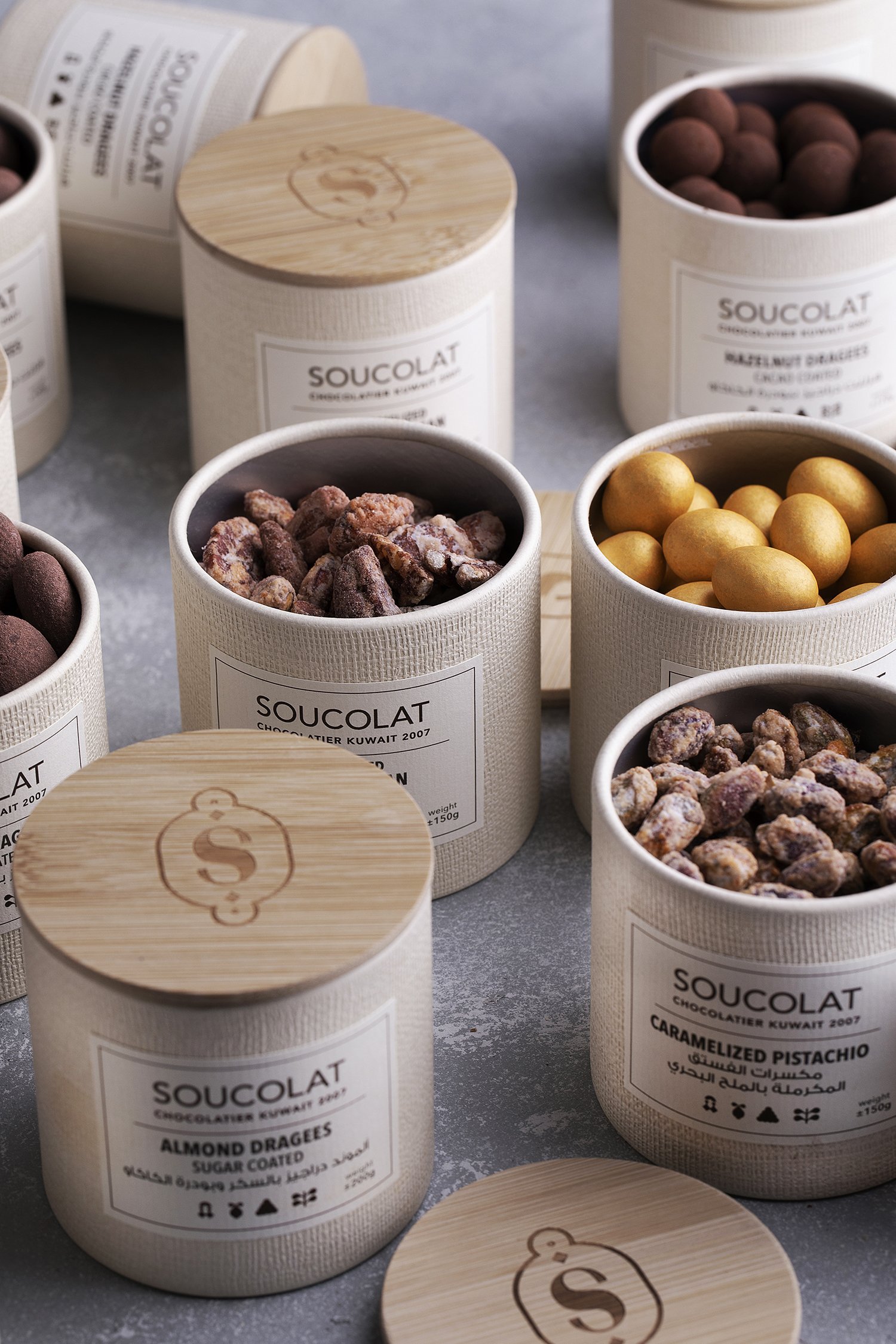 Open containers of assorted chocolates and candies 