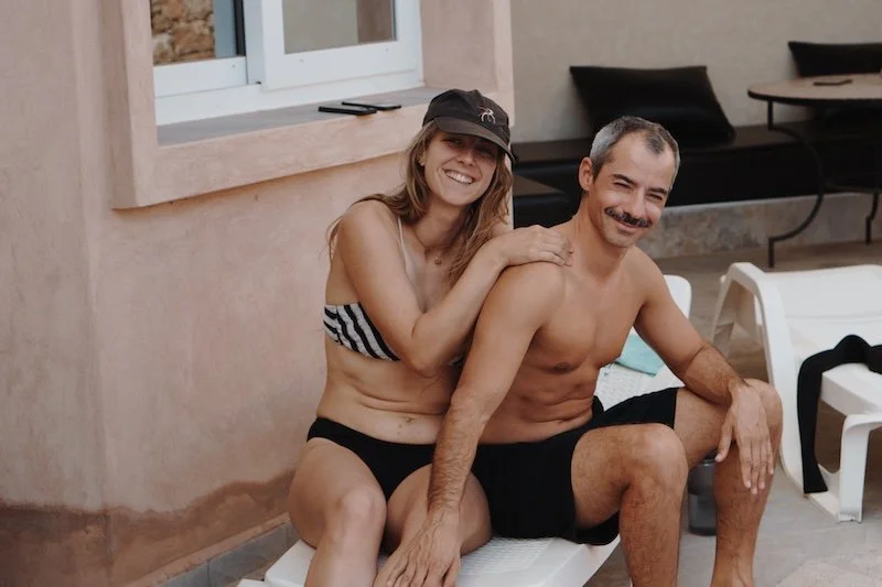 Guests relaxing at the pool of the villa