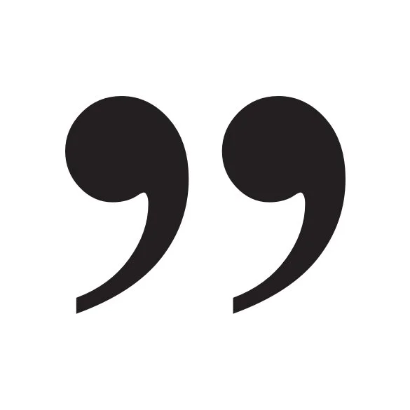 Large black quotation marks on a white background.