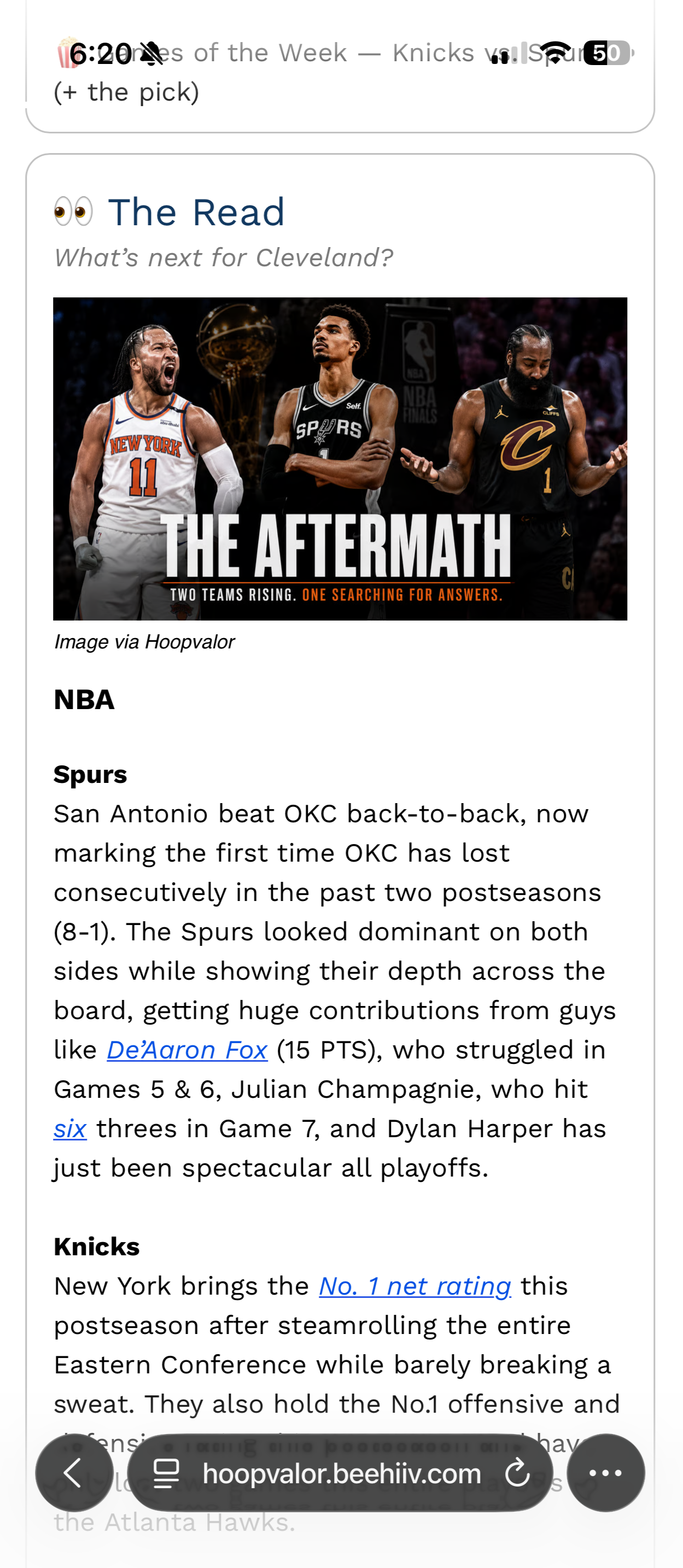 Smartphone displaying a news alert about Anthony Edwards signing a five-year, $215 million extension with the Timberwolves.
