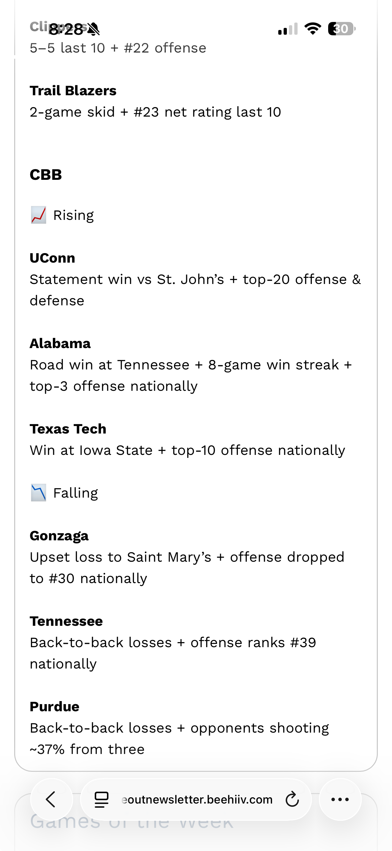 Smartphone displaying a news alert about Anthony Edwards signing a five-year, $215 million extension with the Timberwolves.