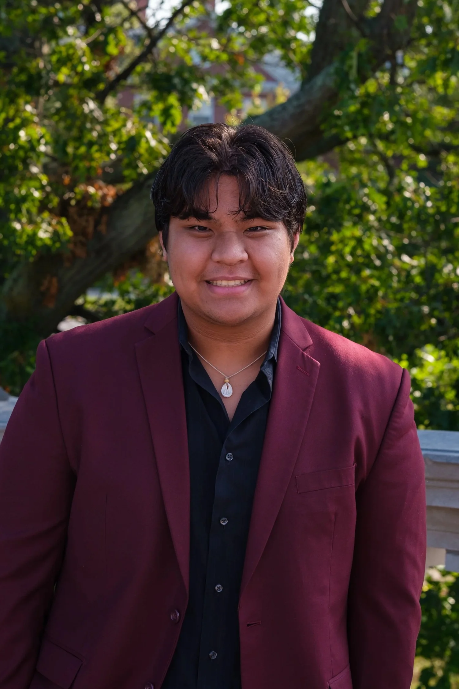 Placeholder image indicating a user profile or avatar with a gray circular head and shoulders on a light gray background.