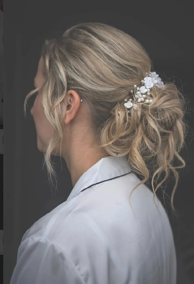 Smooth , loose curly , low bun