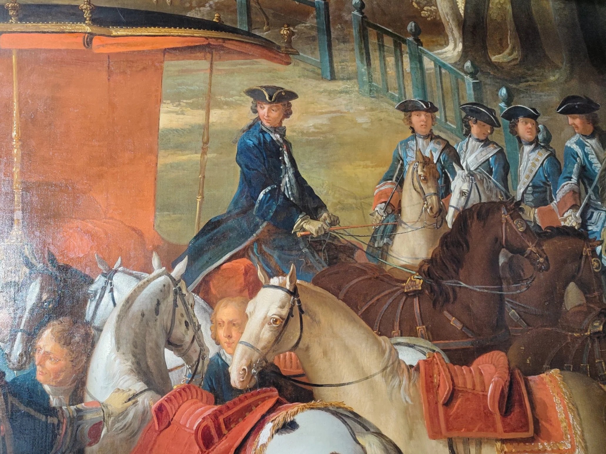 Tableau représentant des officiers et des cavaliers en uniformes d'époque, probablement du XVIIIe siècle, avec des chevaux décorés et une scène de parade ou de cérémonie militaire.