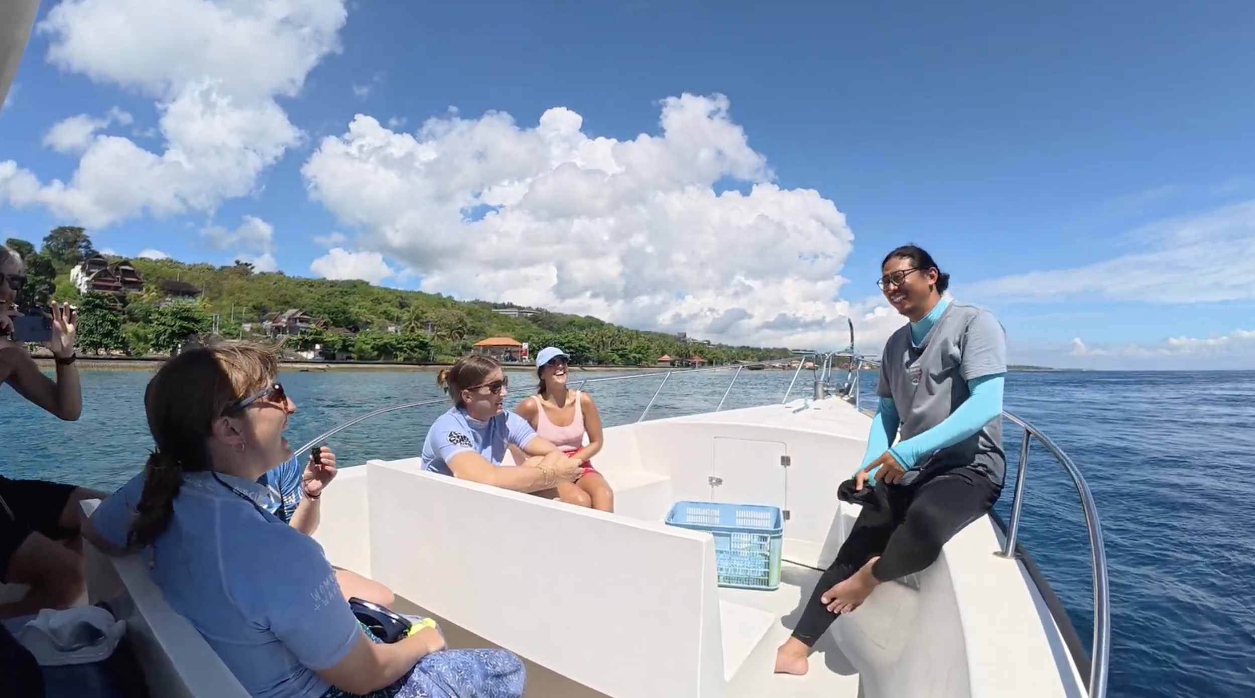 Yudi teaching a group of guests before snorkelling