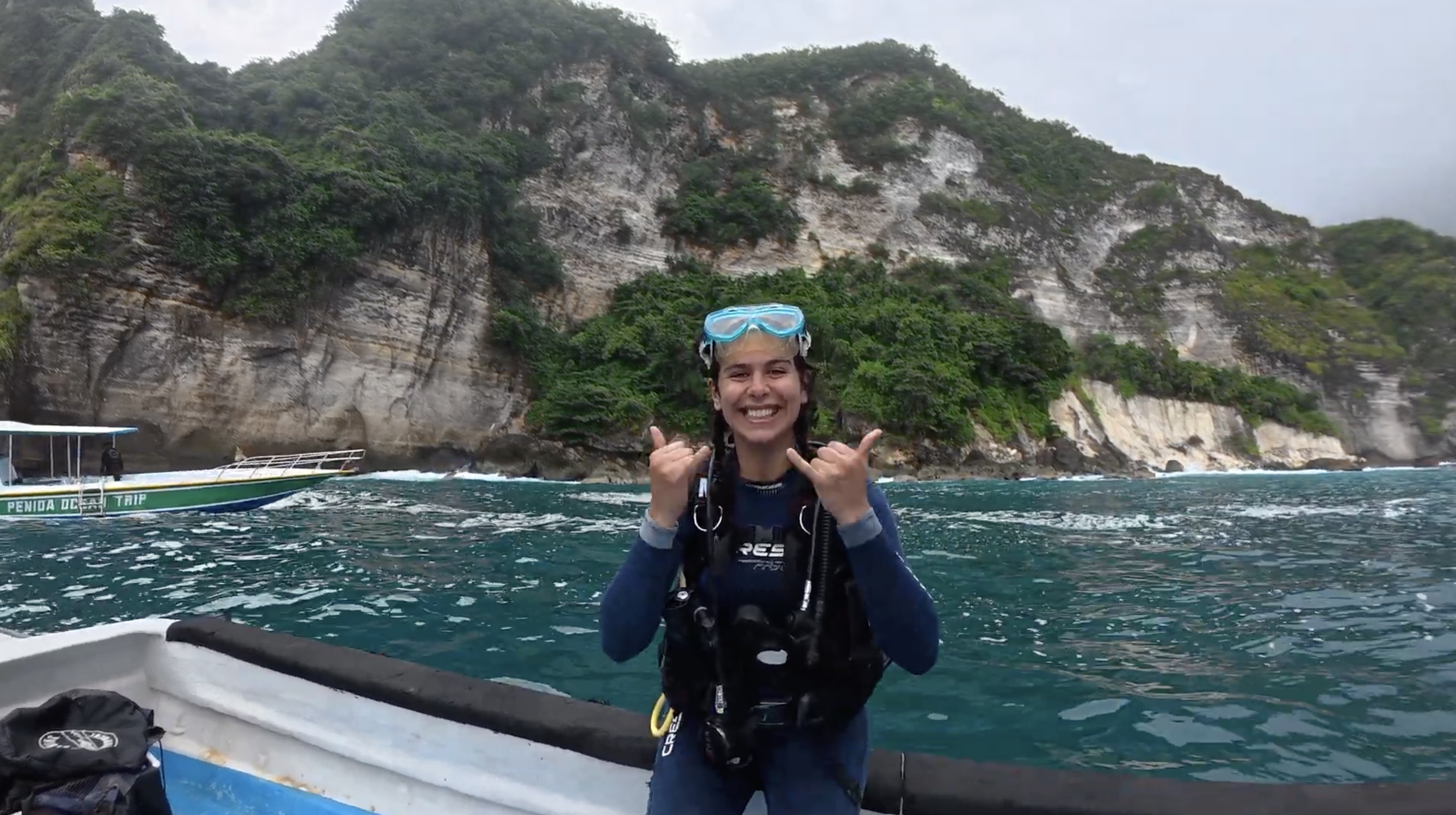 Deli smiling before a dive