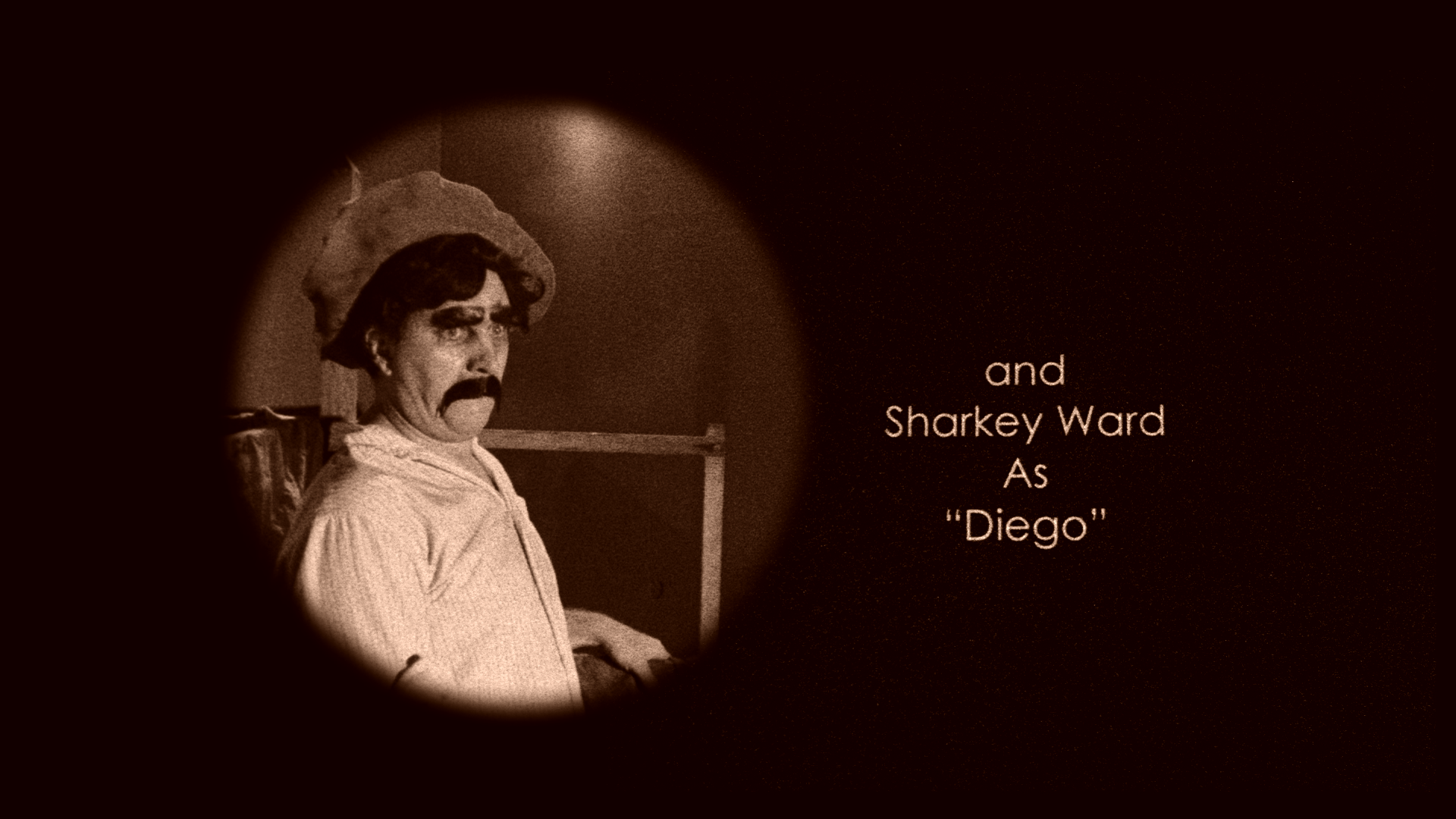 Black and white television screen showing a man in costume with a hat, mustache, and sad facial expression, alongside text that reads 'and Sharkey Ward As "Diego"'.