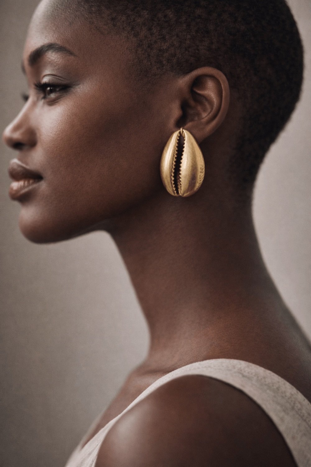 cocoacentricCowrie Studs.jpeg