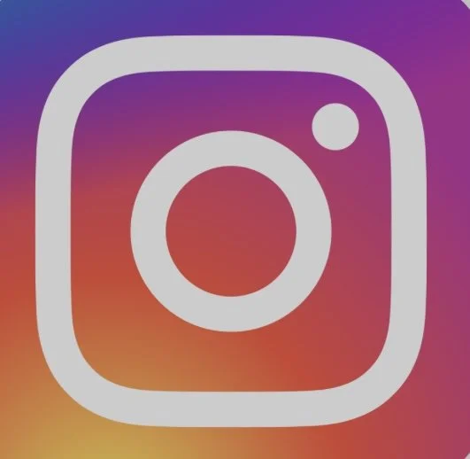 Instagram logo with a white camera outline and a dot, set against a gradient background of purple, pink, orange, and yellow.