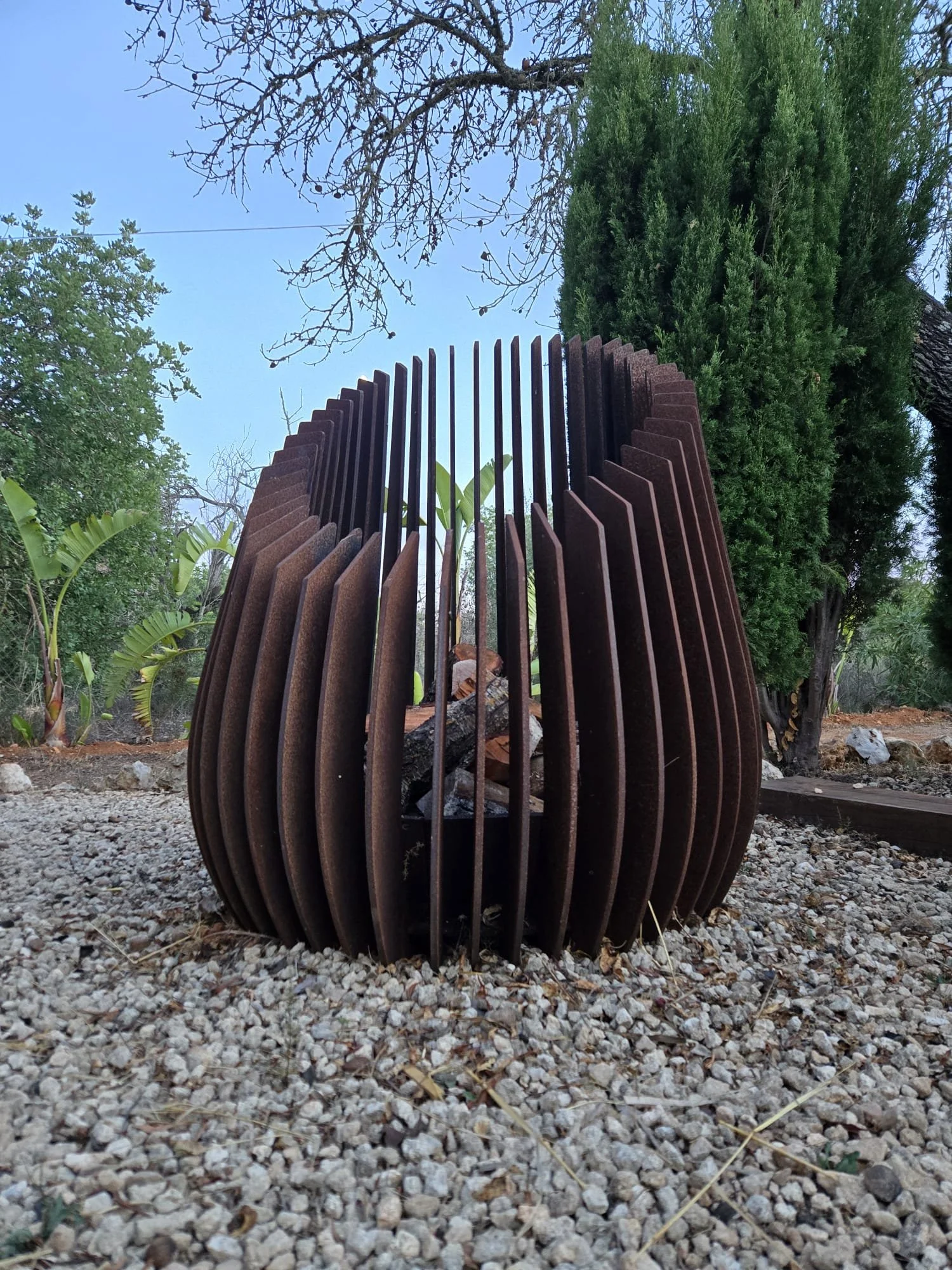 sleek, modern, minimalistic, fire pit in Mallorca available for sale as well as for hire.