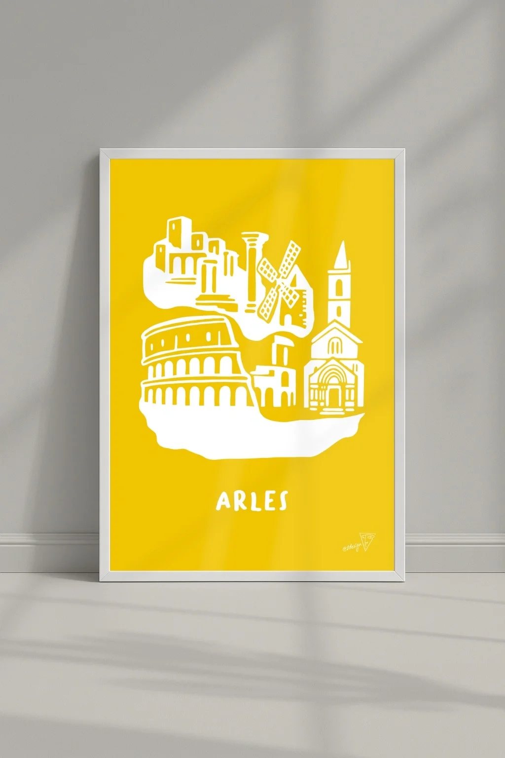 Affiche ville Arles dans un cadre, illustration graphique jaune et blanche du Sud-Est