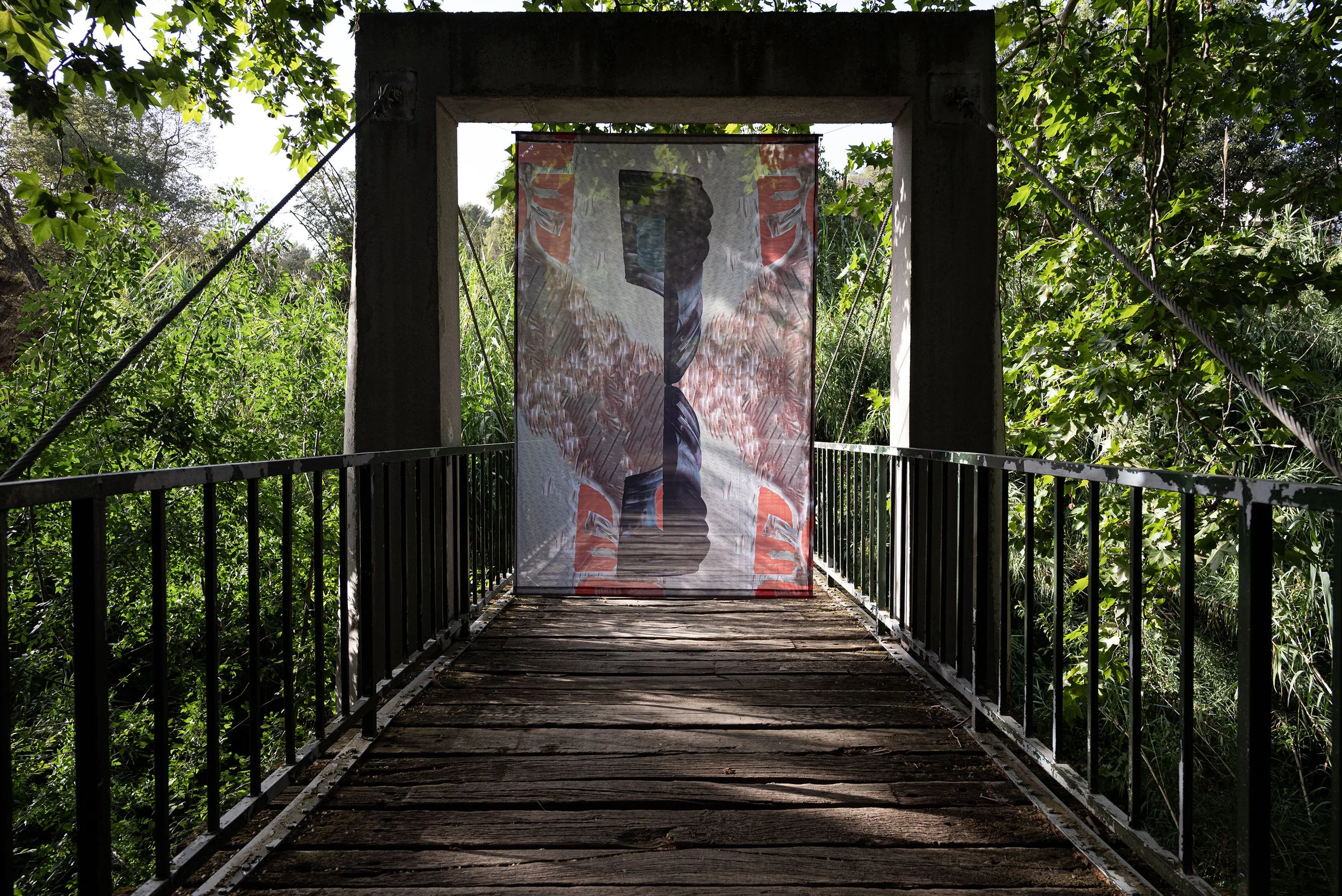 Christopher Squier: "There Is Sanity at Sea Level № 4," 2023. Molí de Ca l'Oliver, Sant Quintí de Mediona, Spain. Dye sublimation print on polyester, 5 × 8 feet. Installation view: Molí de Ca l'Oliver, Sant Quintí de Mediona, Spain. Artwork created a