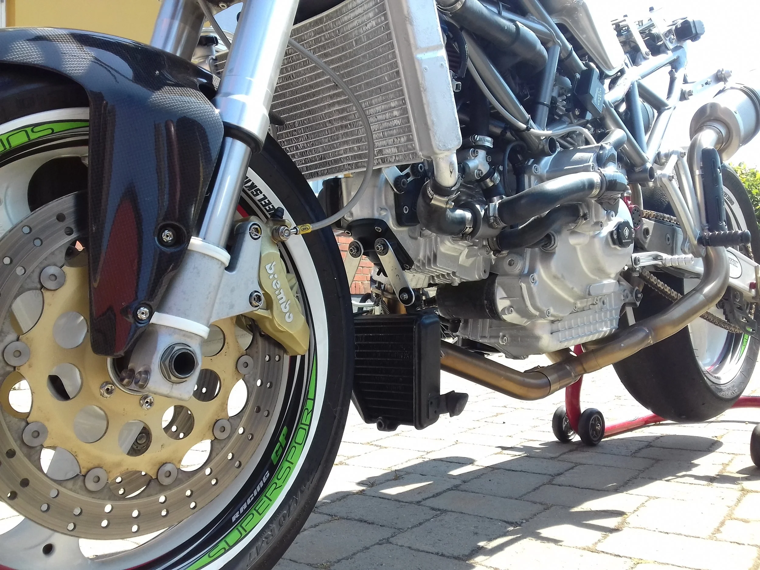 Ducati without fairings and close up of engine