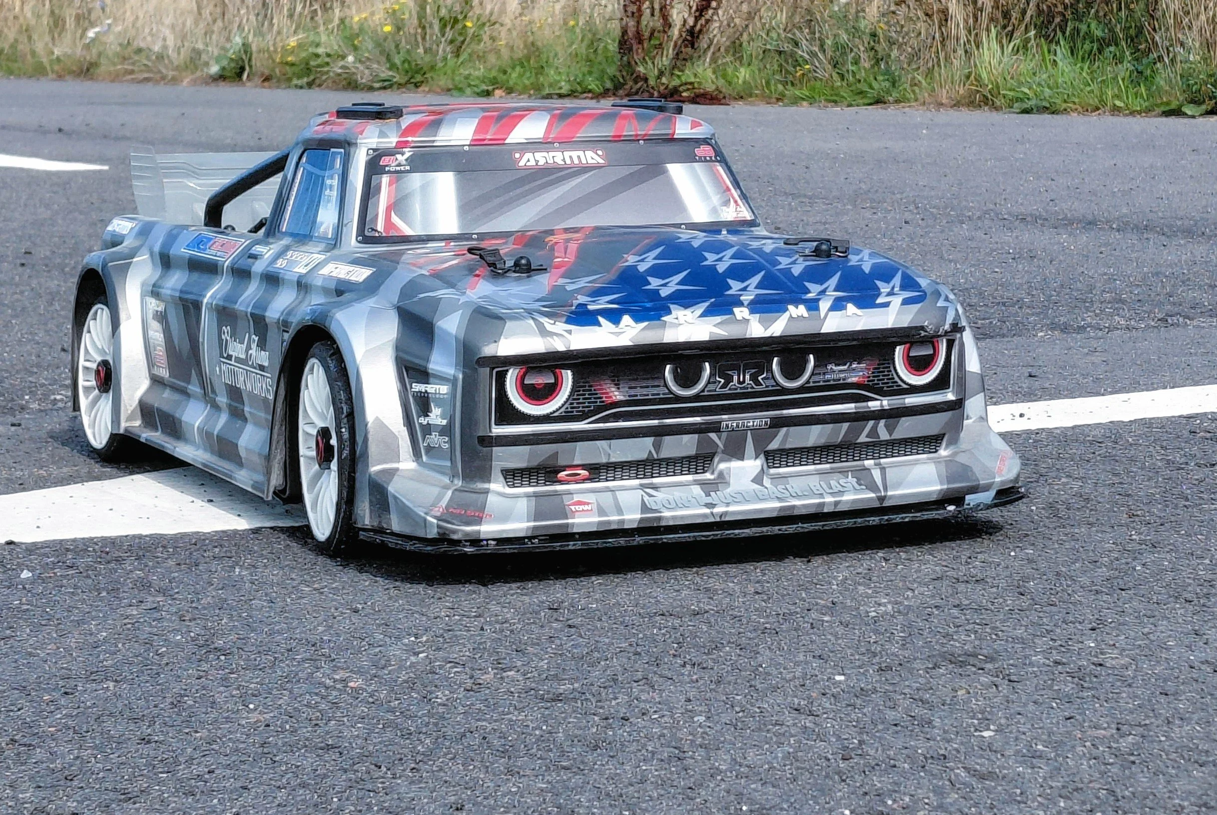 arrma infraction on a asfalt surface