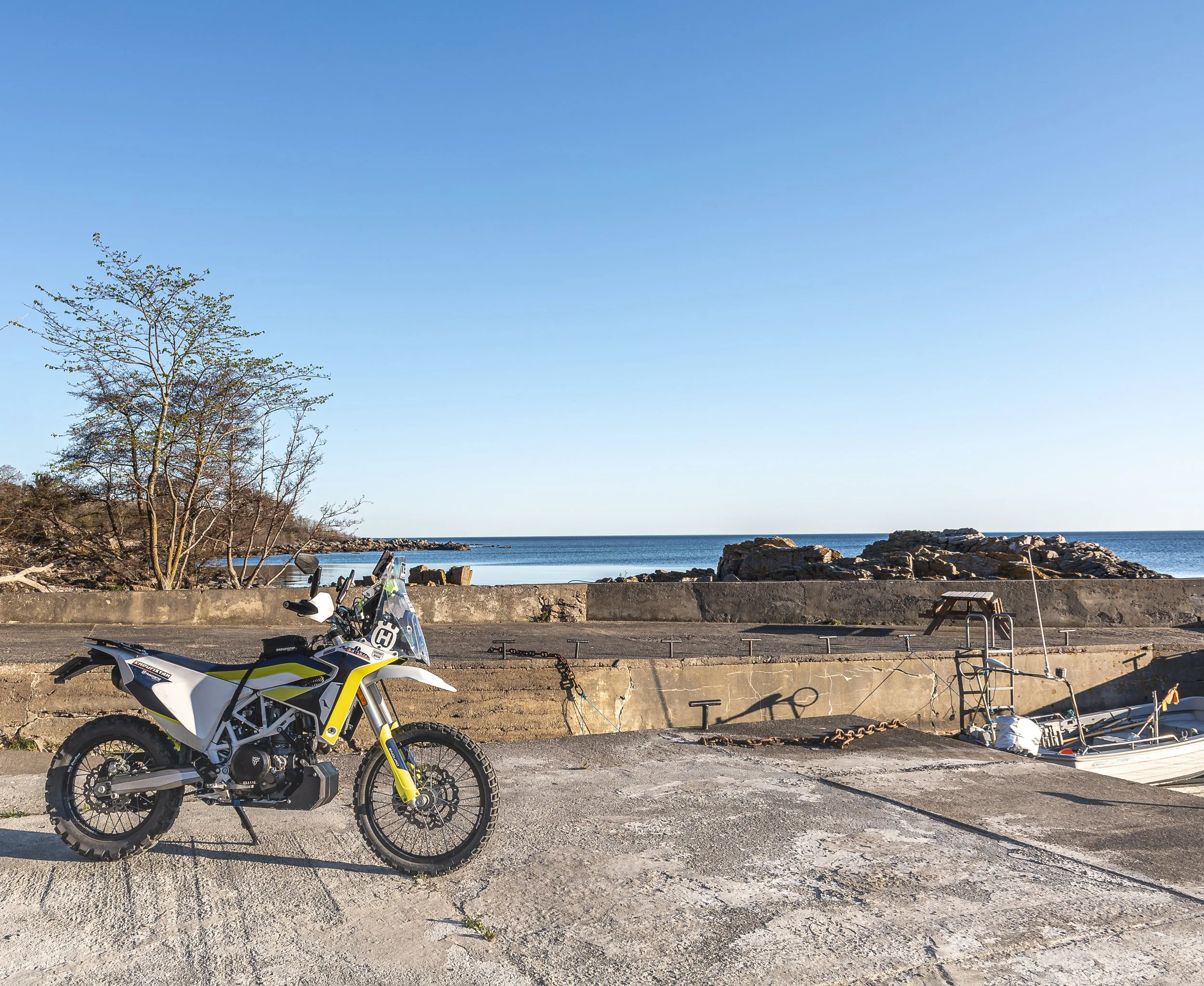 Husqvarna 701 parked at a pier