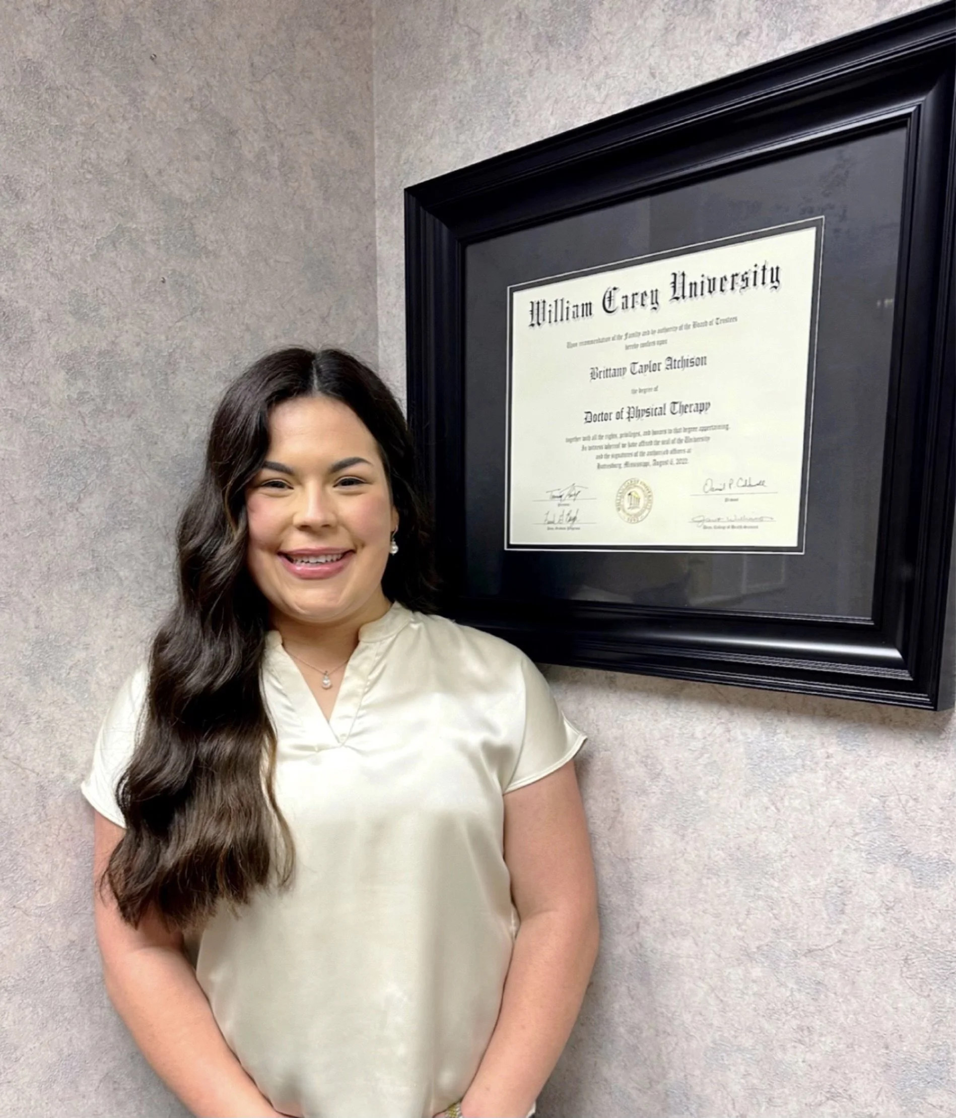 Brittany Atchison former NCAA gymnast practicing physical therapy at the Clinic of Orthopaedic and Sports Physical Therapy in Tacoma, Washington