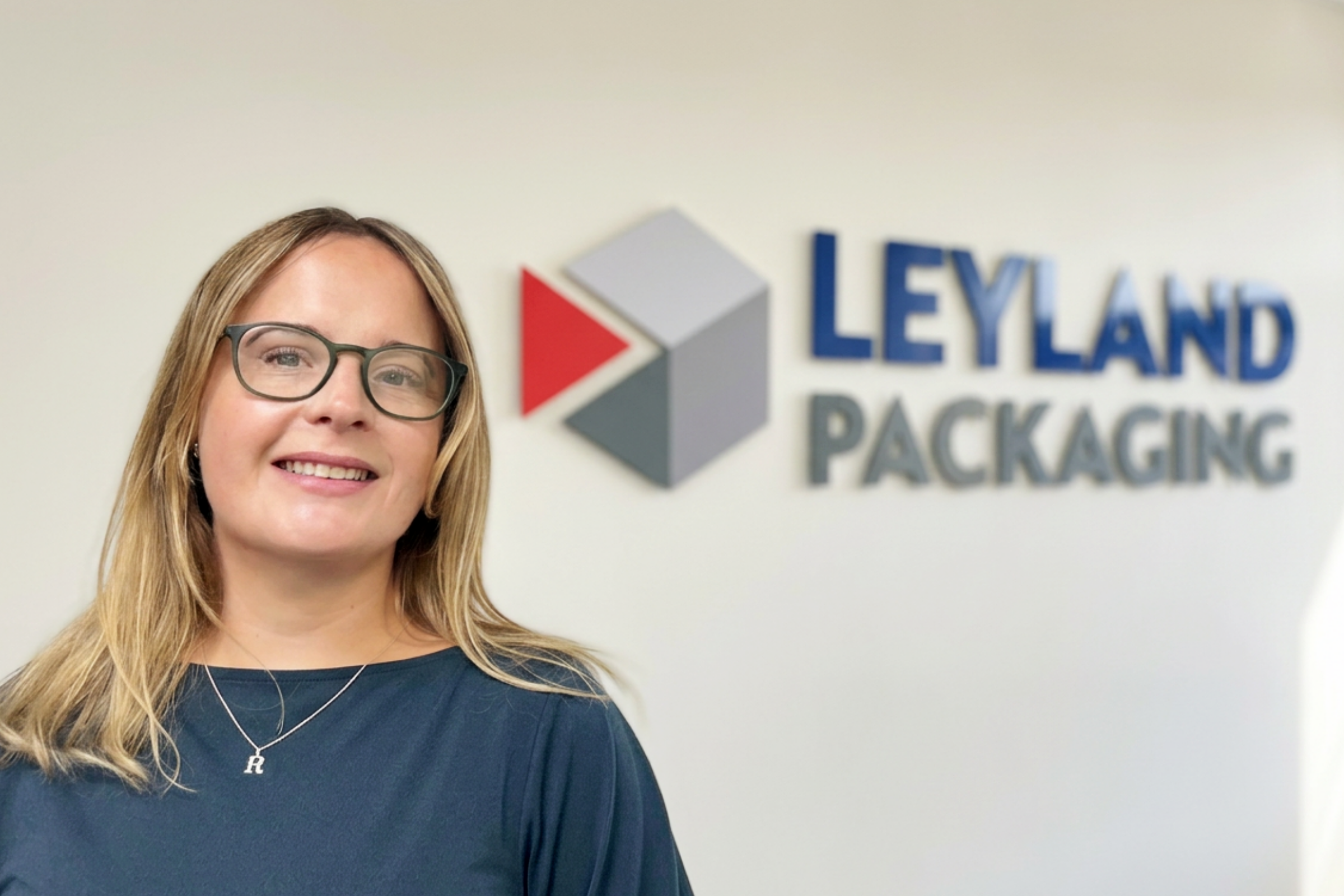Leyland Packaging Business Development Manager Rebecca Dolan pictured in office company signage in background