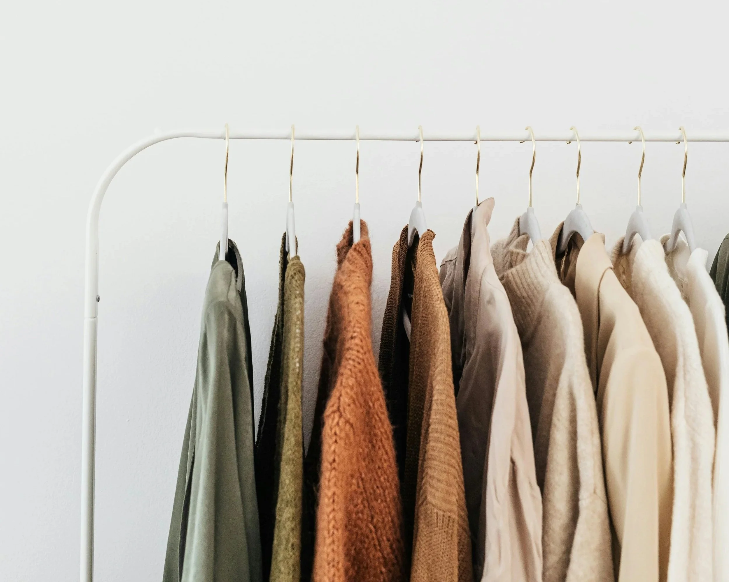 Fashion garments on hangers showing retail clothing storage and display for Northampton boutiques and online stores