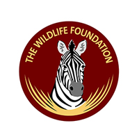 Logo of The Wildlife Foundation featuring a zebra's head inside a red circular emblem
