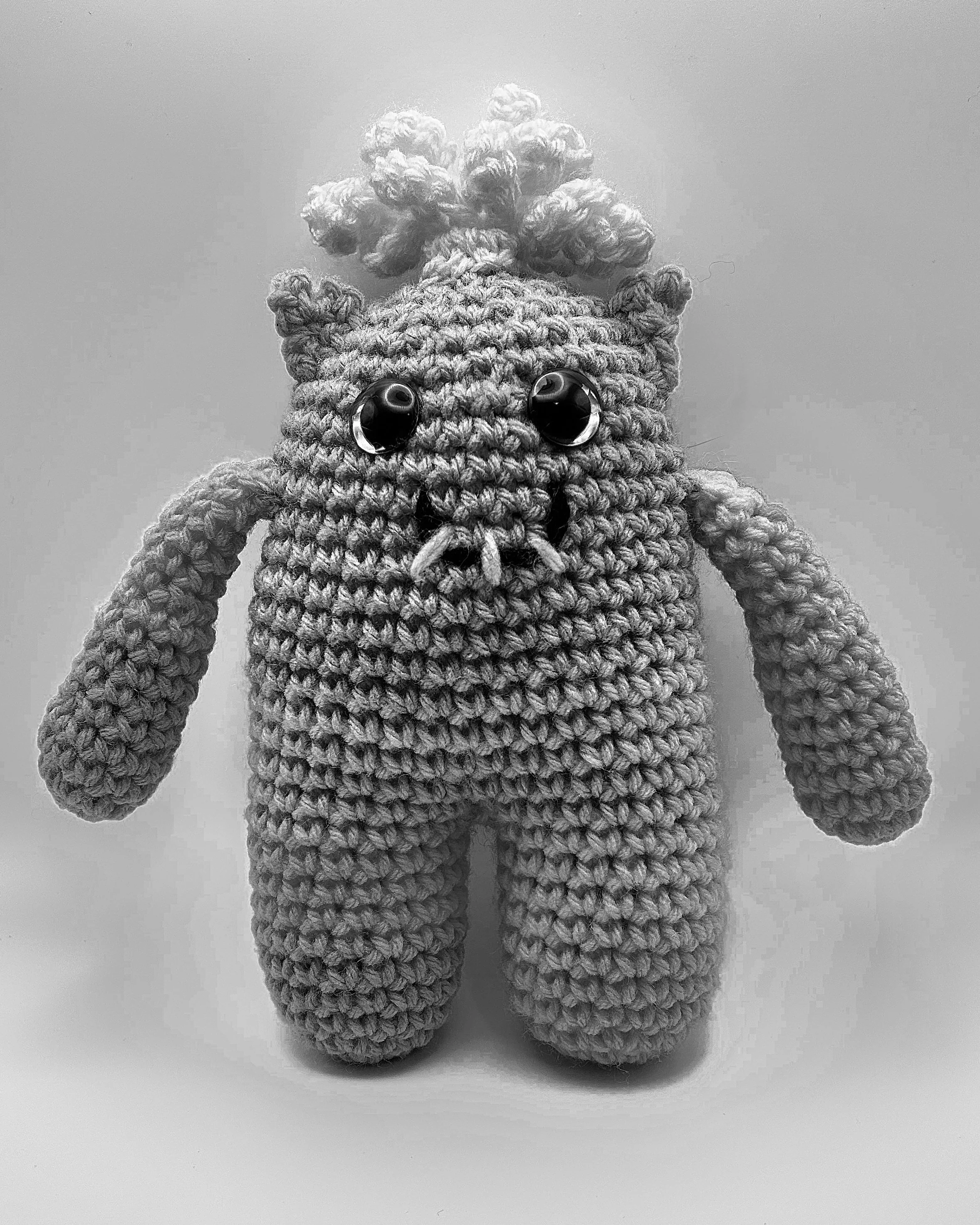 black and white monster with banner noting custom options available