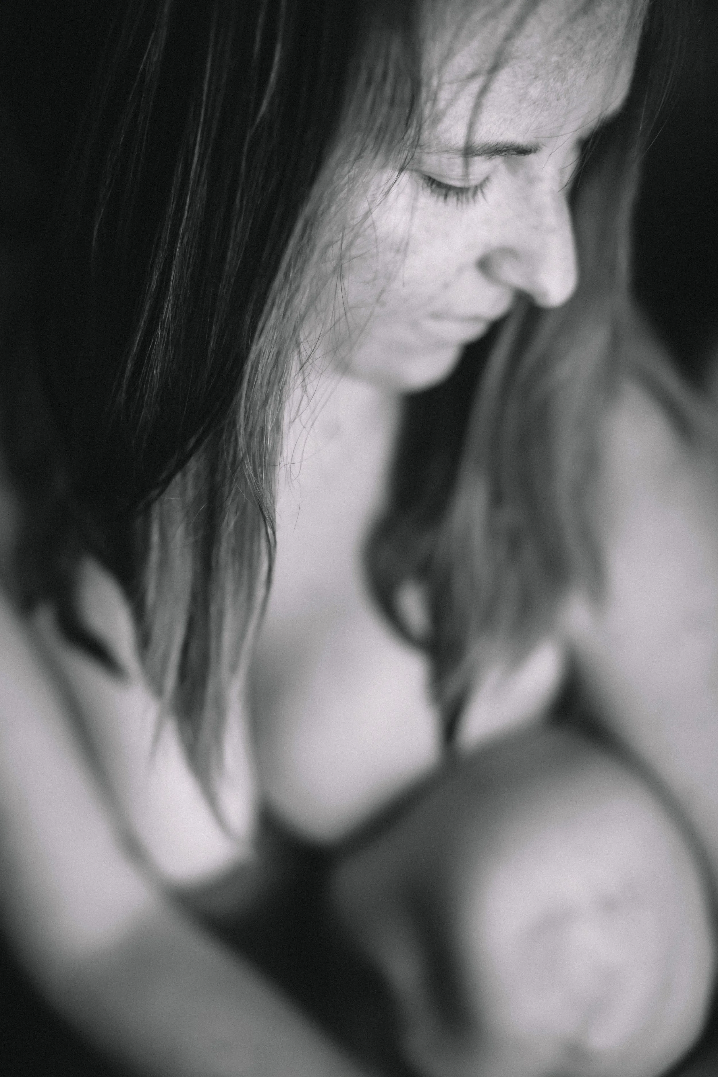 Intimate black and white close-up portrait of a woman in peaceful profile, The Raw Project by Emily Scott, Beaufort SC