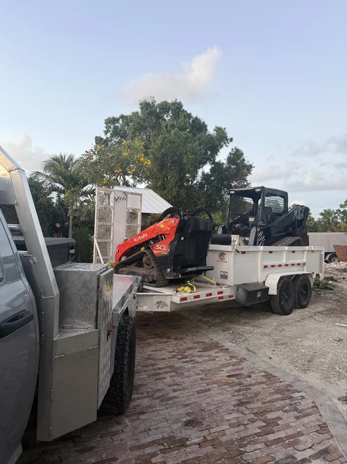 Excavator next to the work truck