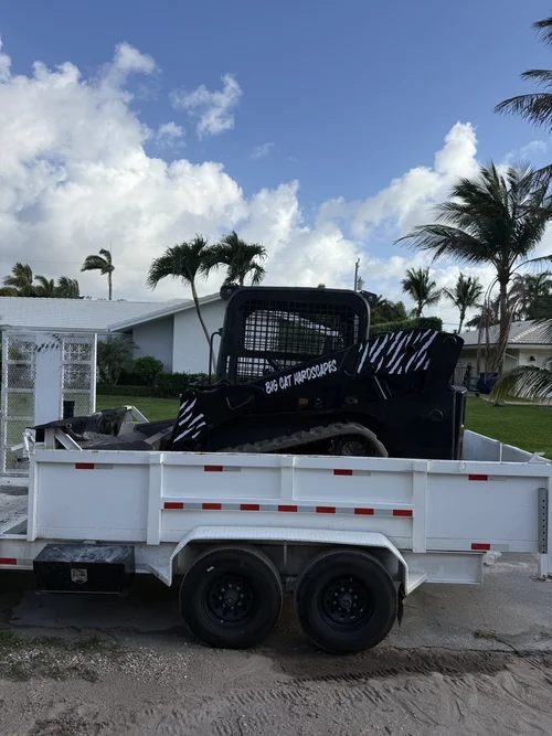 Skid steer loaded on a trailer