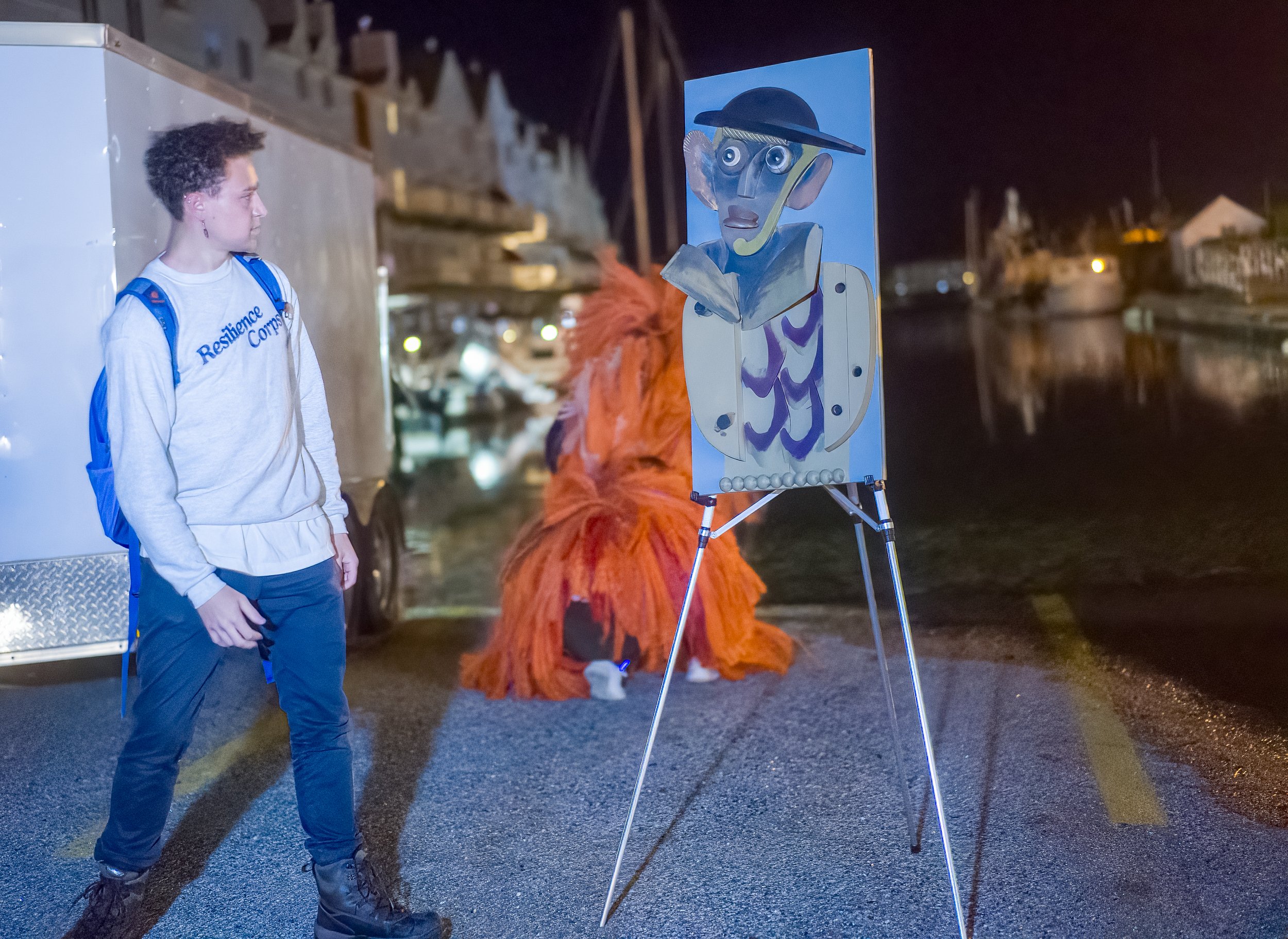 Setting up for an event I organized where we showcased artwork by local artists alongside the floodwaters of Portland while collecting flood data.