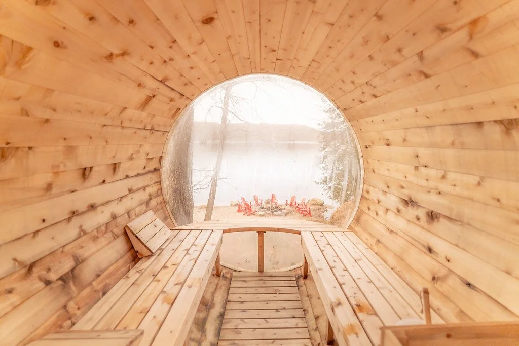 Barrel sauna with panoramic view of the beach and the lake. Sits 6-8