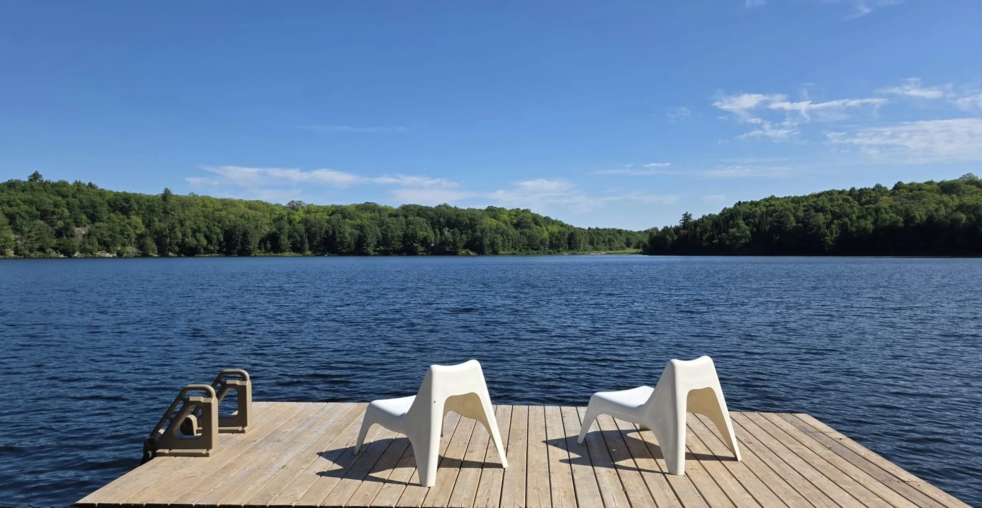 Dock with white chairs.jpeg
