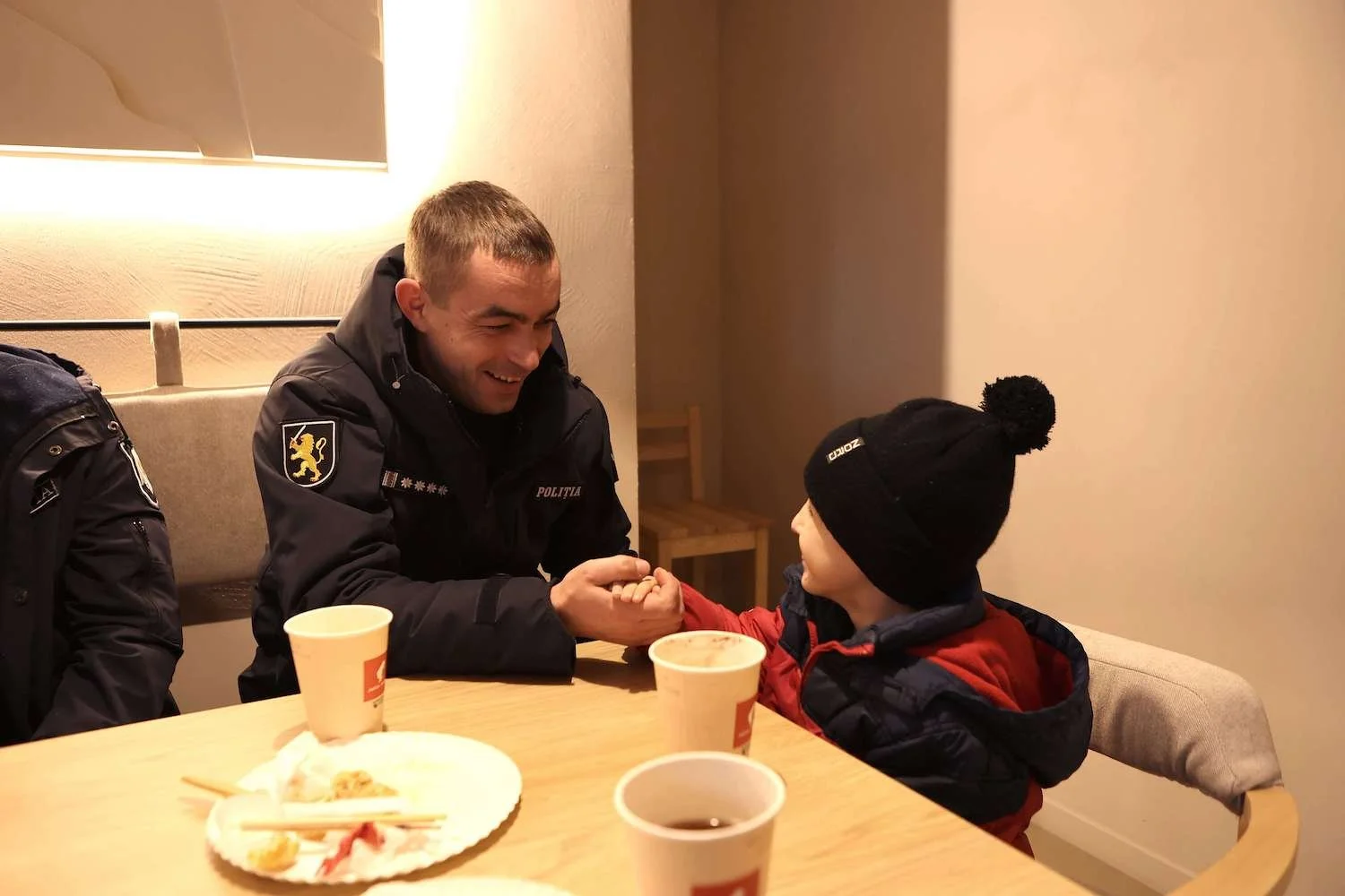 police-with-child-eating.jpeg