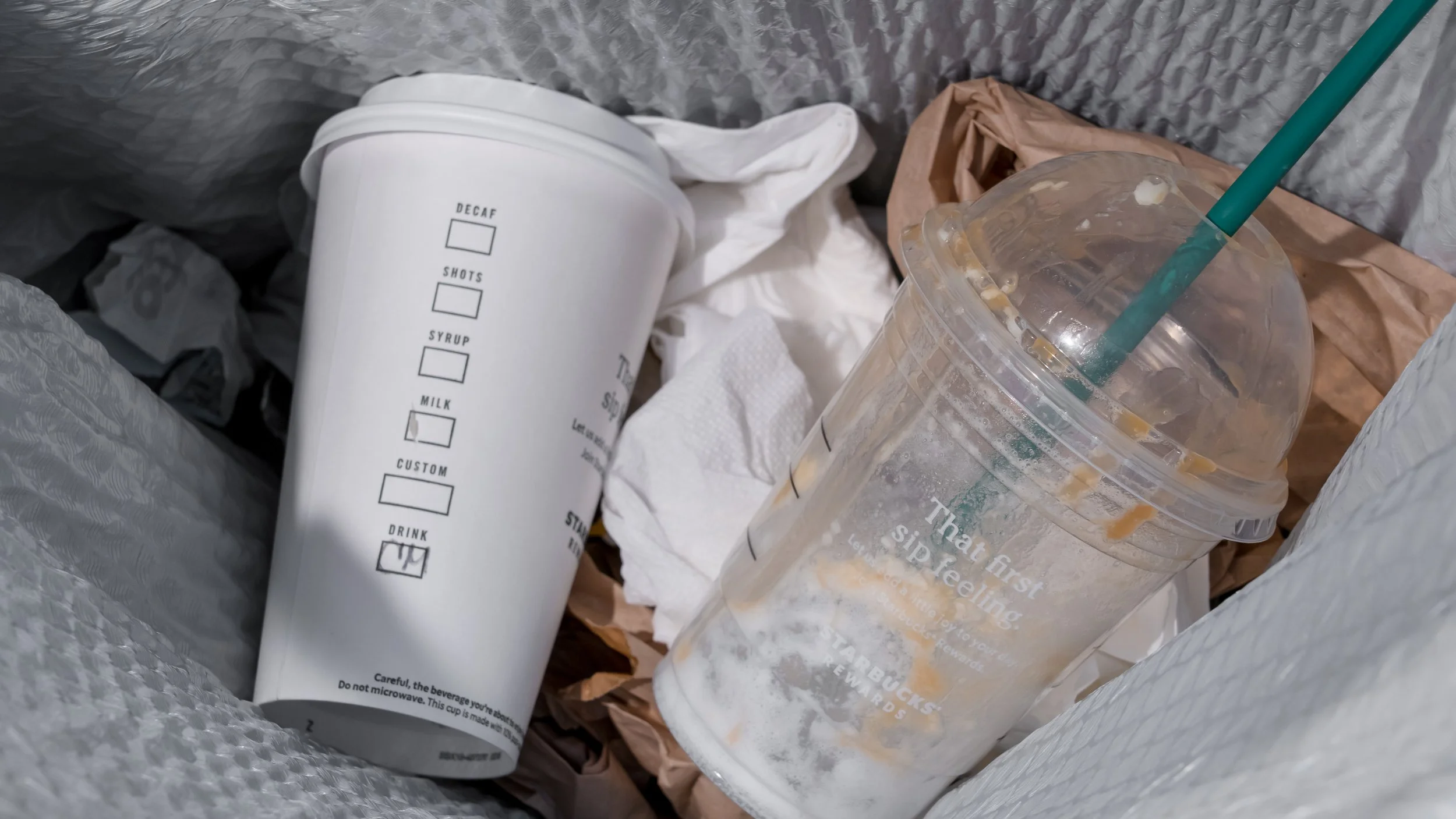 Comparing polypropylene (PP) single-use cold coffee cups, like those used at Starbucks, to paper cups