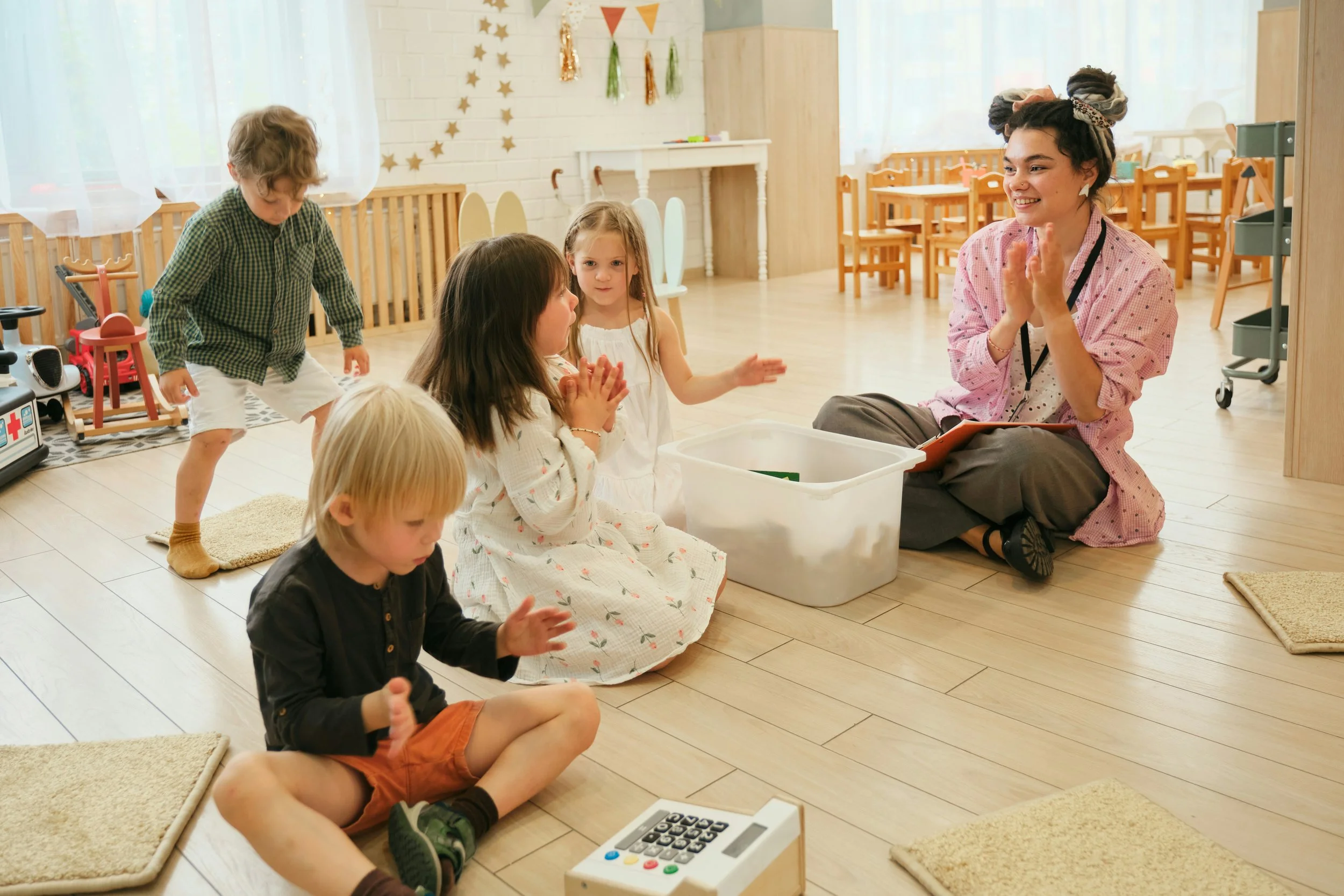 Children in a classroom setting playing happily