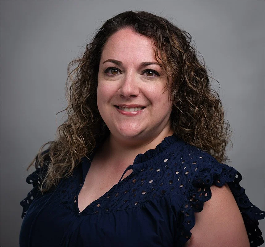 Headshot of a brunette woman