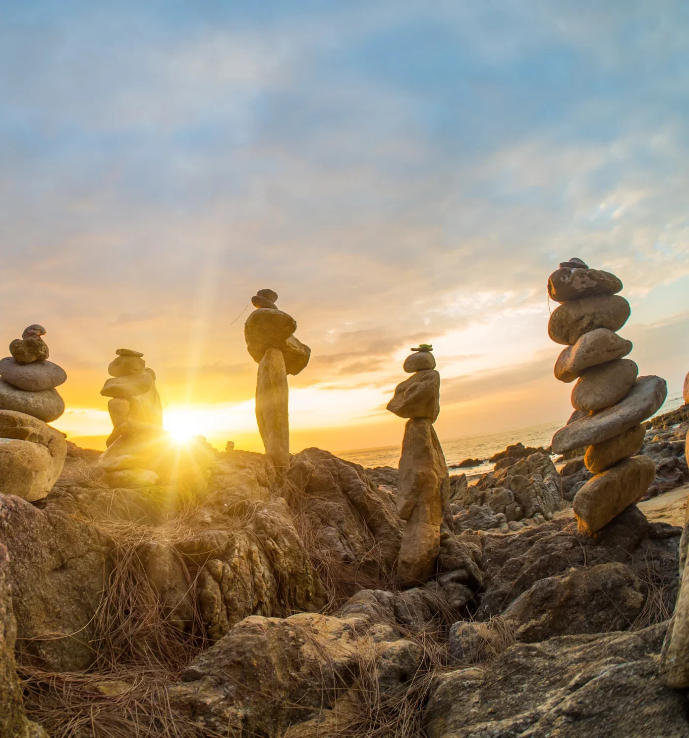 Rock cairns in the sunset