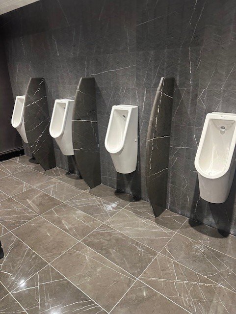 Professional washroom deep cleaning service sanitising fixtures and surfaces for improved hygiene