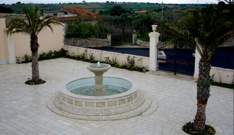 Avalon exterior fountain_Avalon Bush Hammered paving 036A.png