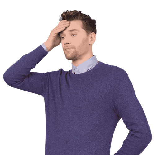 Man with short brown hair and facial hair, wearing a blue sweater over a collared shirt, touching his forehead with a worried or confused expression.