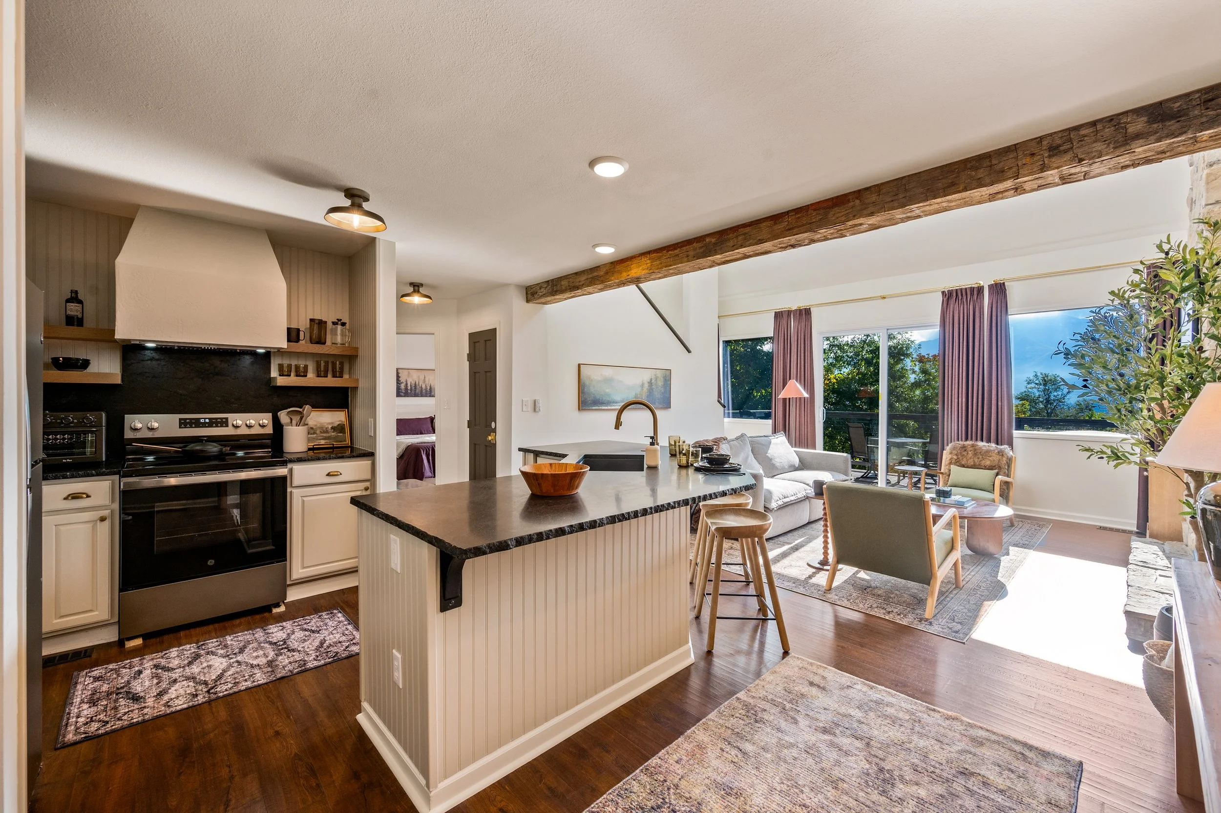 Gather in a bright, open kitchen where modern design meets mountain charm—perfect for slow mornings and shared meals.