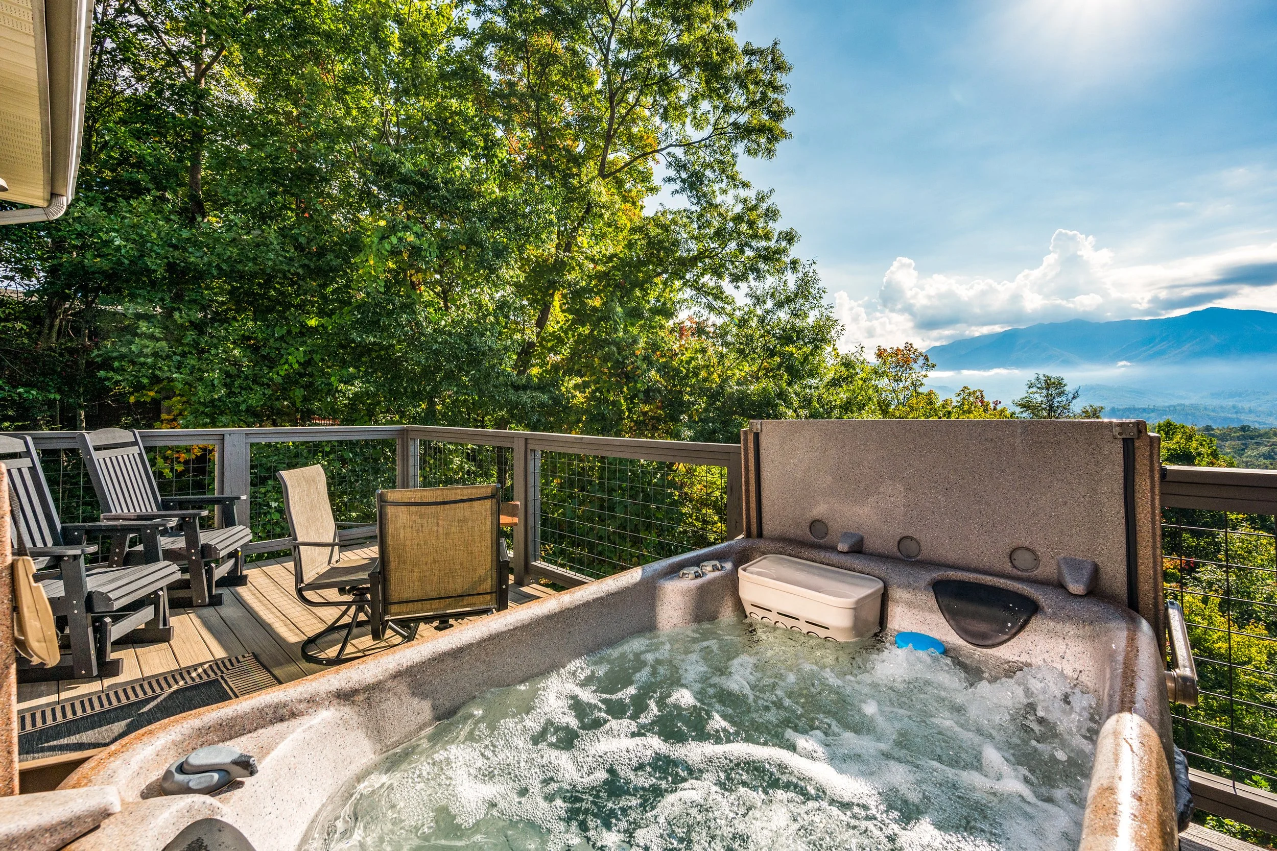 Soak under the stars in a secluded hot tub surrounded by lush trees and the sounds of nature.