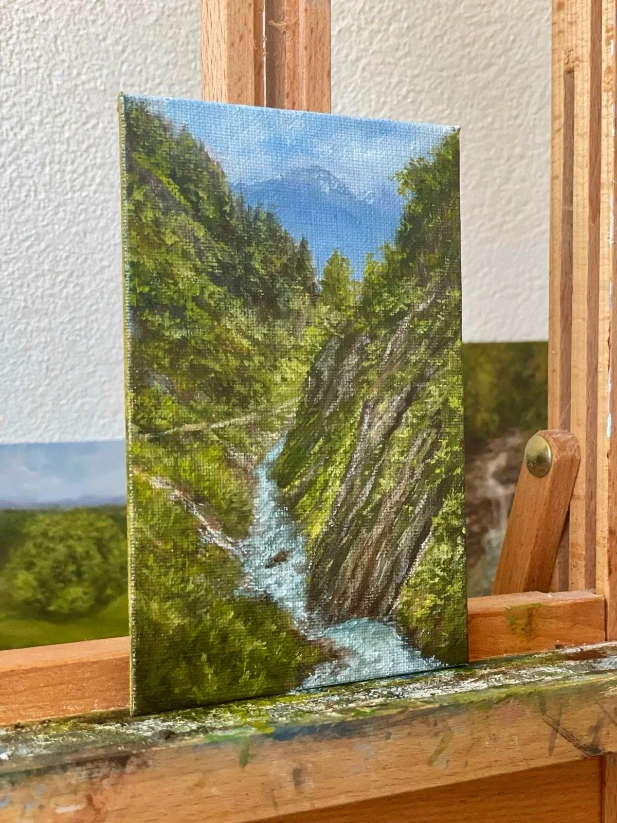 Mockup_Where+Water+Wispers+Through+Stone_OnEasel.jpg