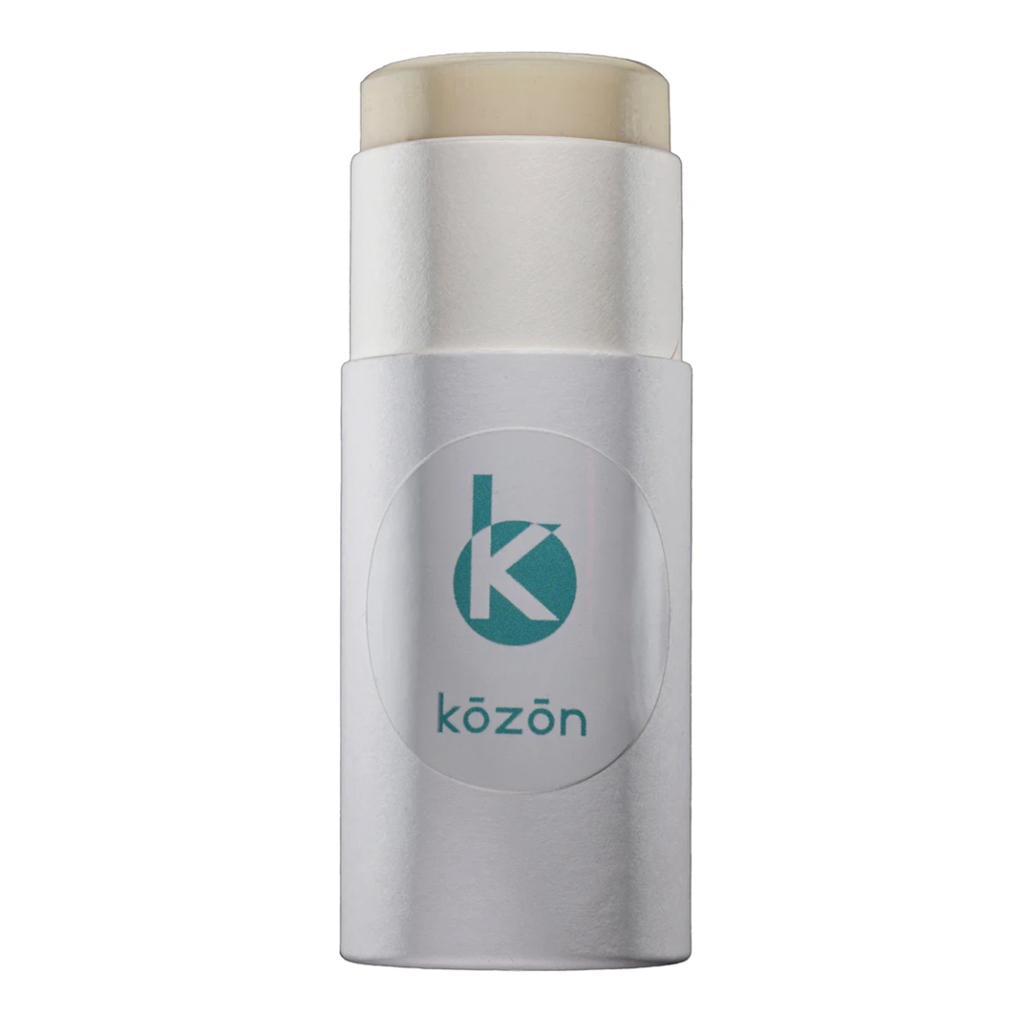A white stick of deodorant with a beige cap, featuring a teal logo with the letter 'k' and the word 'közön' on the label.