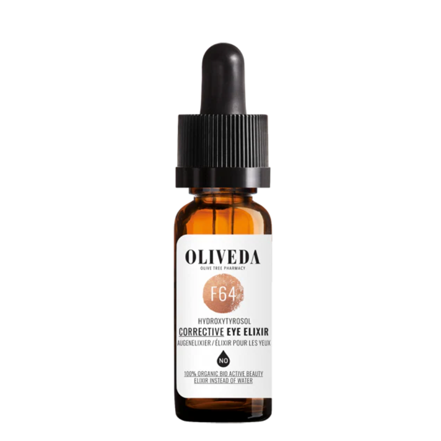 Amber glass dropper bottle labeled Oliveda Hydroxytyrosol Corrective Eye Elixir with F64, featuring a black dropper cap, and containing organic eye care solution.