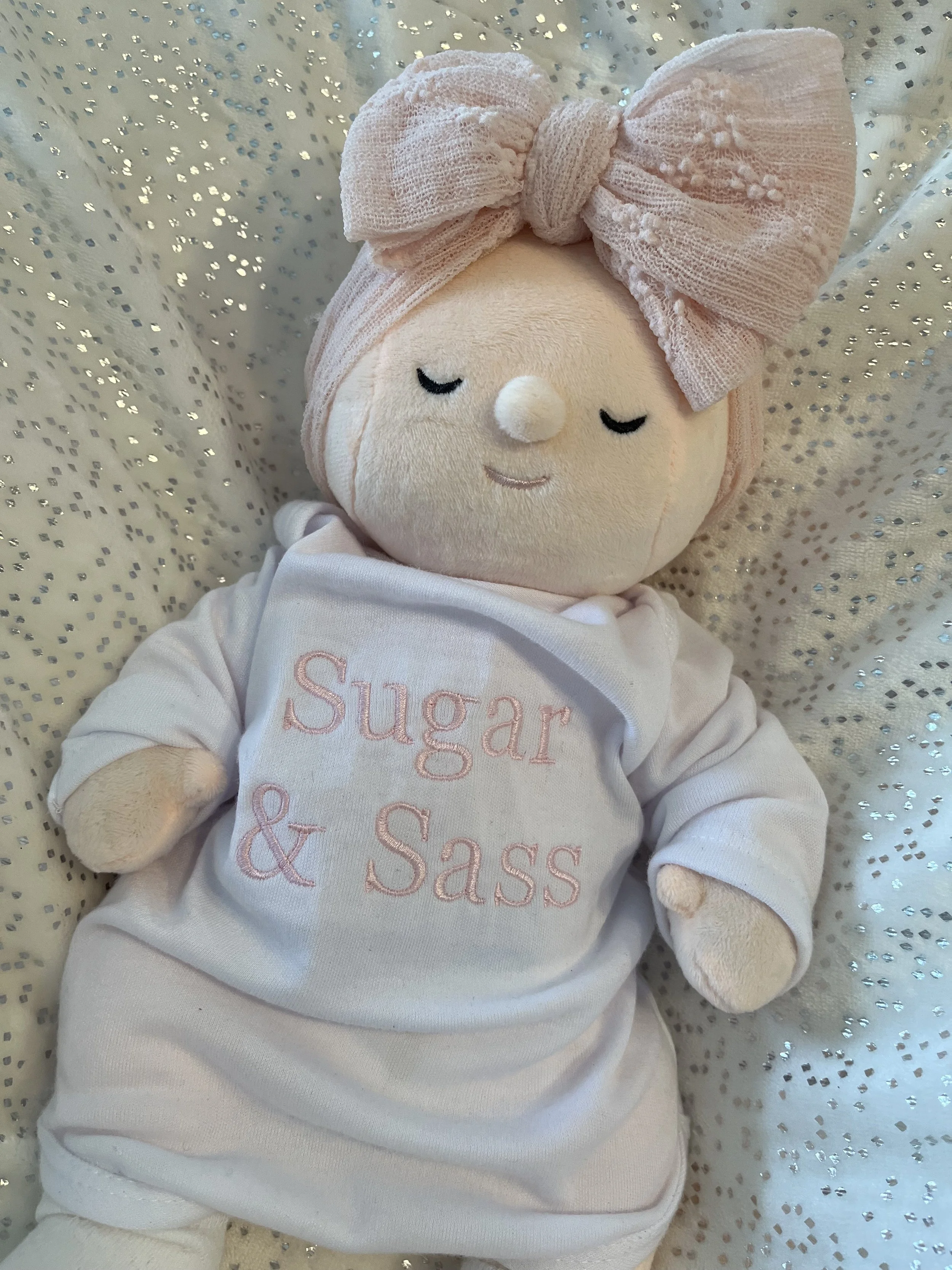 Biscuit is a stuffed, weighted baby doll