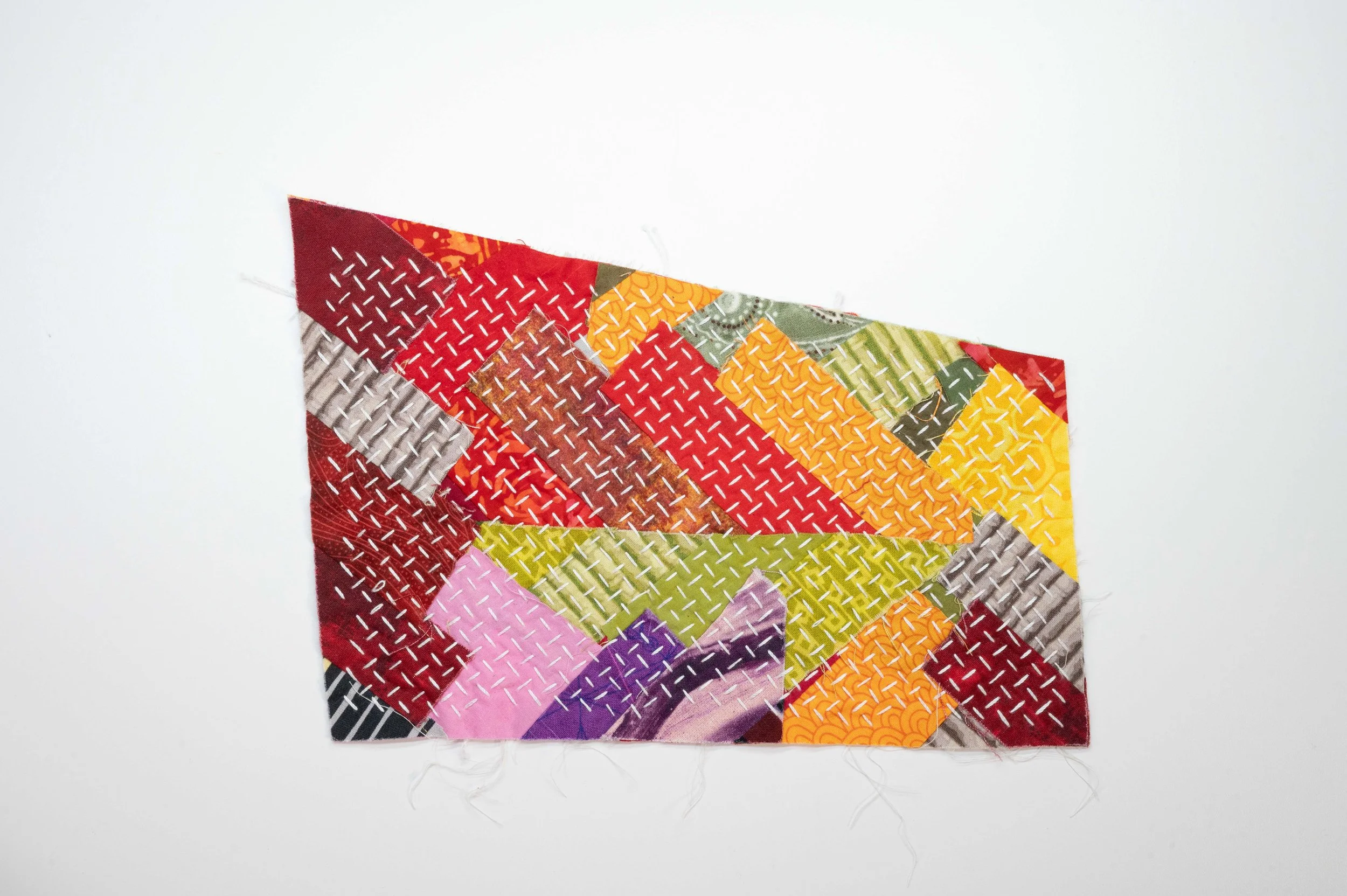 Reclaimed no. 14 • 2025
• Improv pieced reclaimed and hand-dyed fabric, hitomezasii sashiko
• 5 x 9 in.
• Available