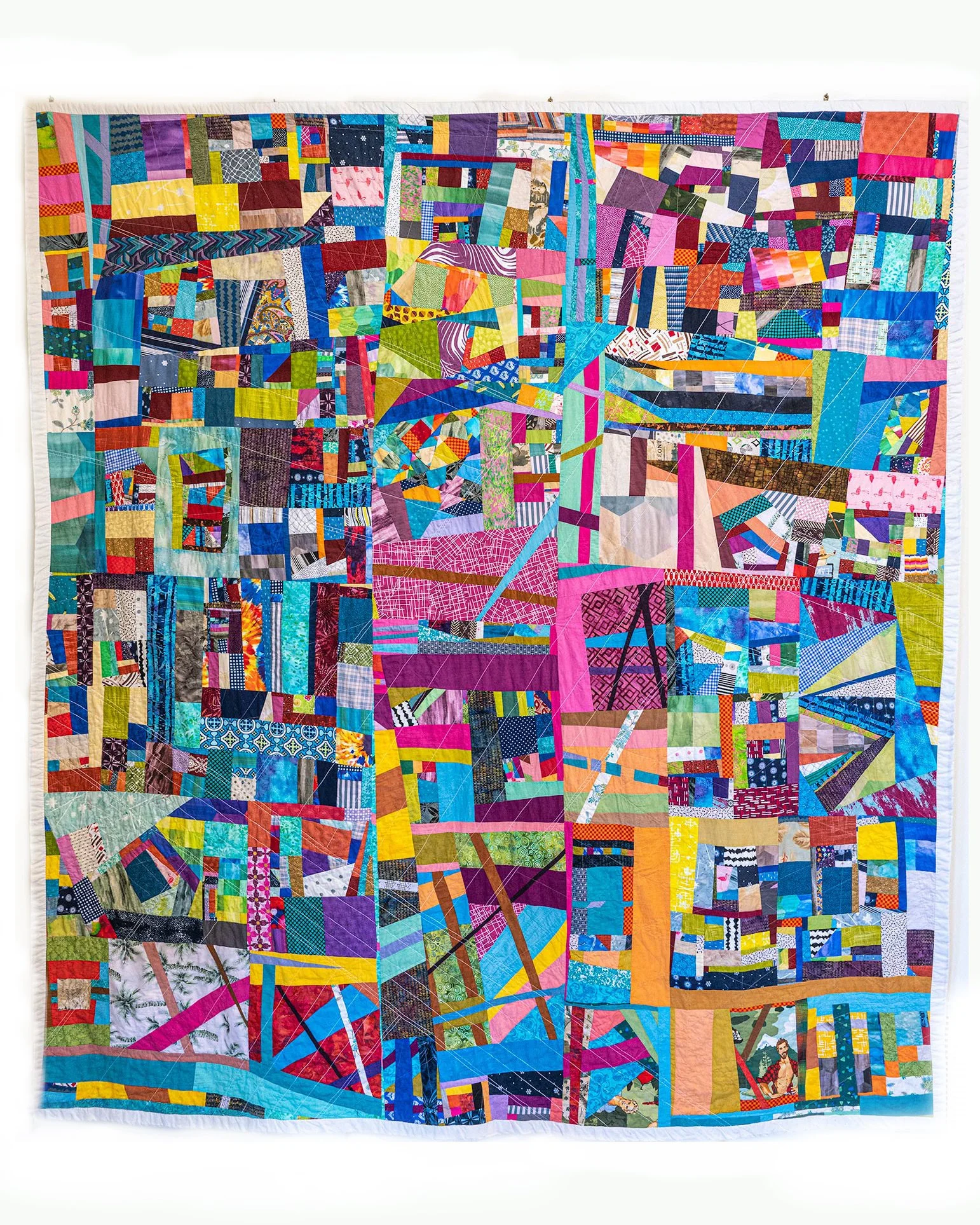 The Beast: Abstract quilt from collected scraps and pieces from previous projects. Began as a test of the process, now is a King size quilt.