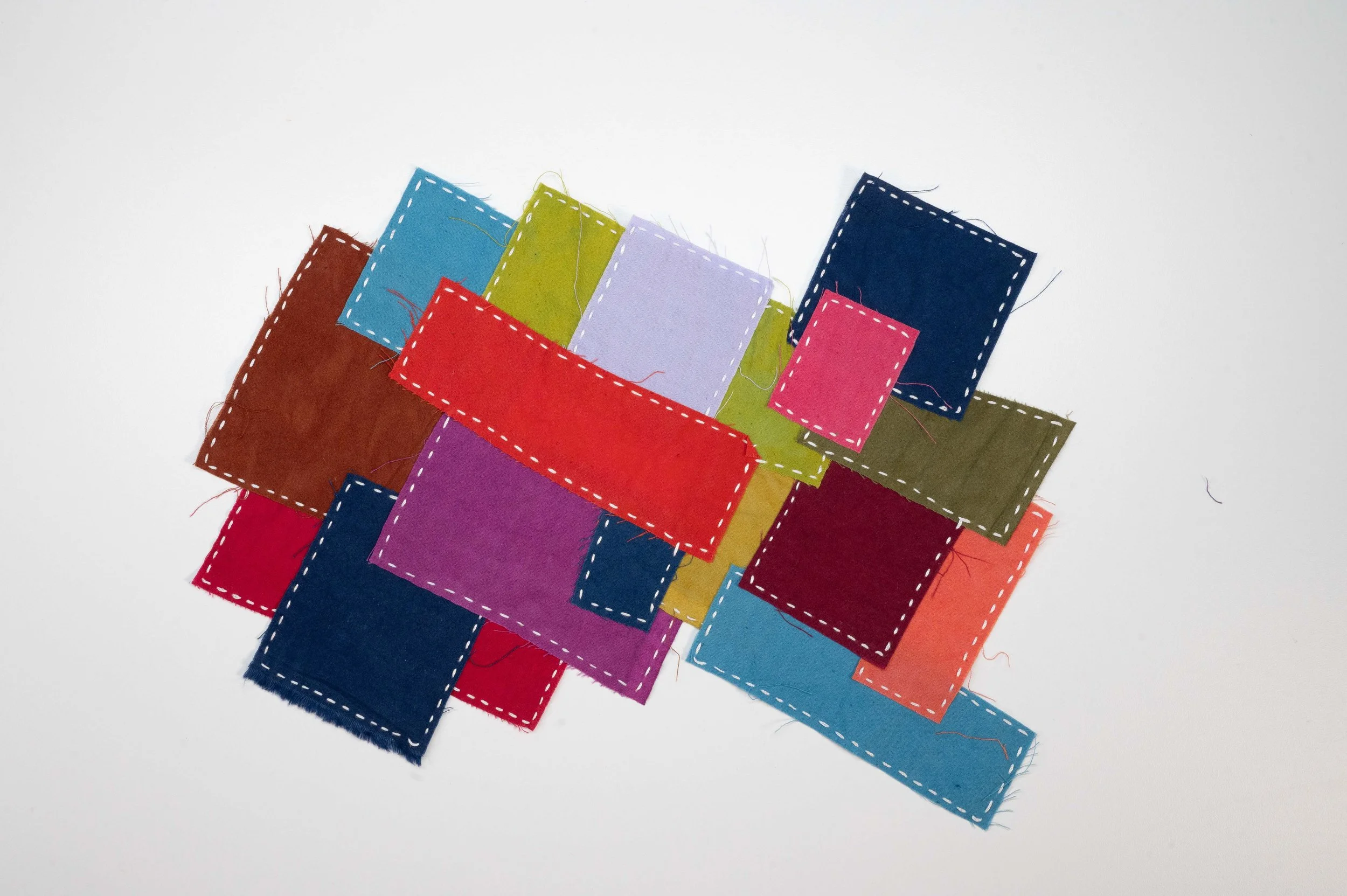 Stacked Blocks • 2026 
• Cherrywood Hand Dyed Fabric scraps and offcuts. Hand stitched in Boro style with moyouzashi style sashiko stitching.
• 8 x 12" 
• Available: Inquire for price