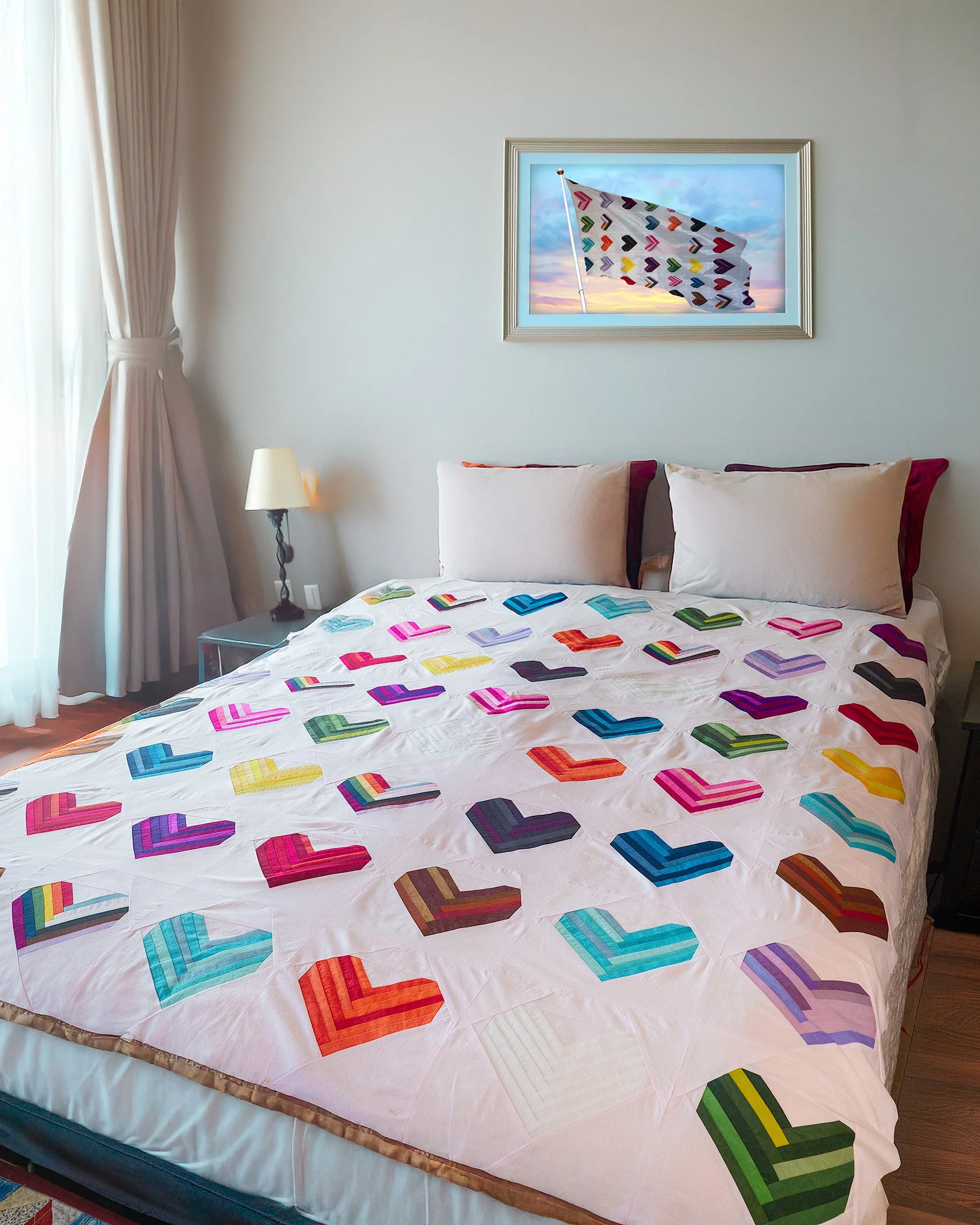 Pride of my heart quilt-on bed tall.jpg