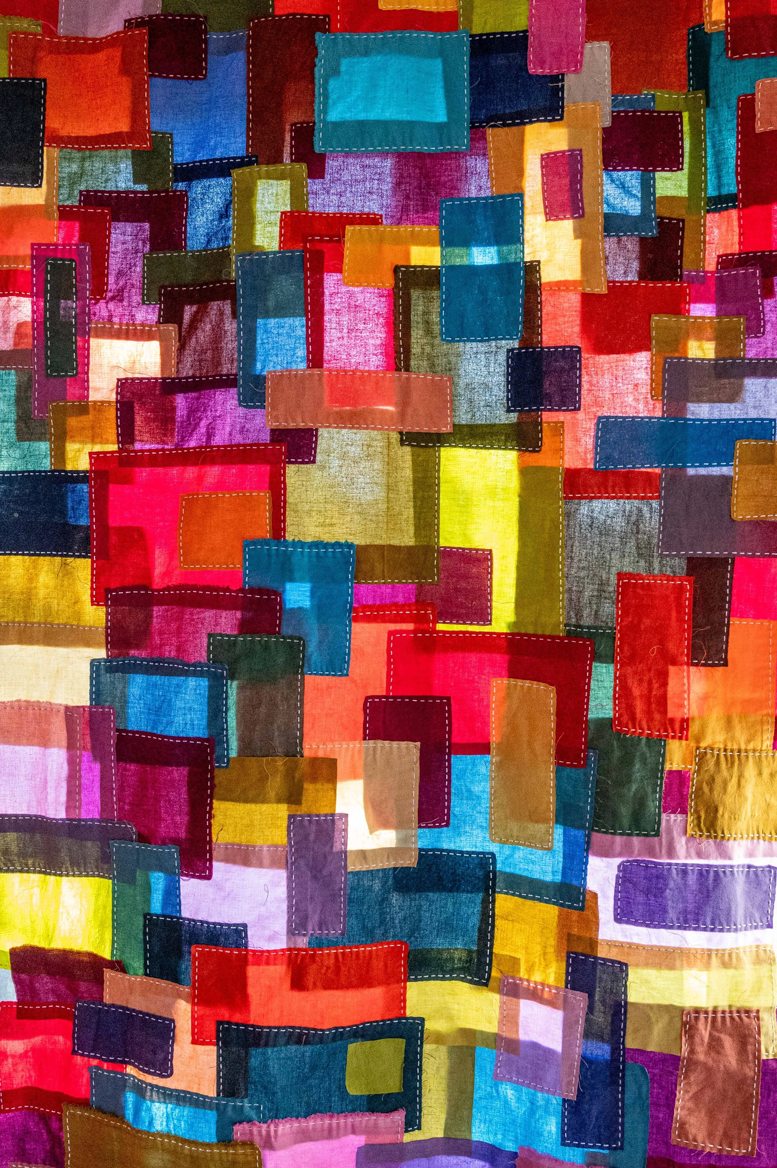 Lightbringer • 2026 • Cherrywood Hand Dyed Fabric cotton scraps and offcuts. Hand stitched in Boro style with moyouzashi style sashiko stitching.
• 80"x 28". 
• Available: Inquire for price